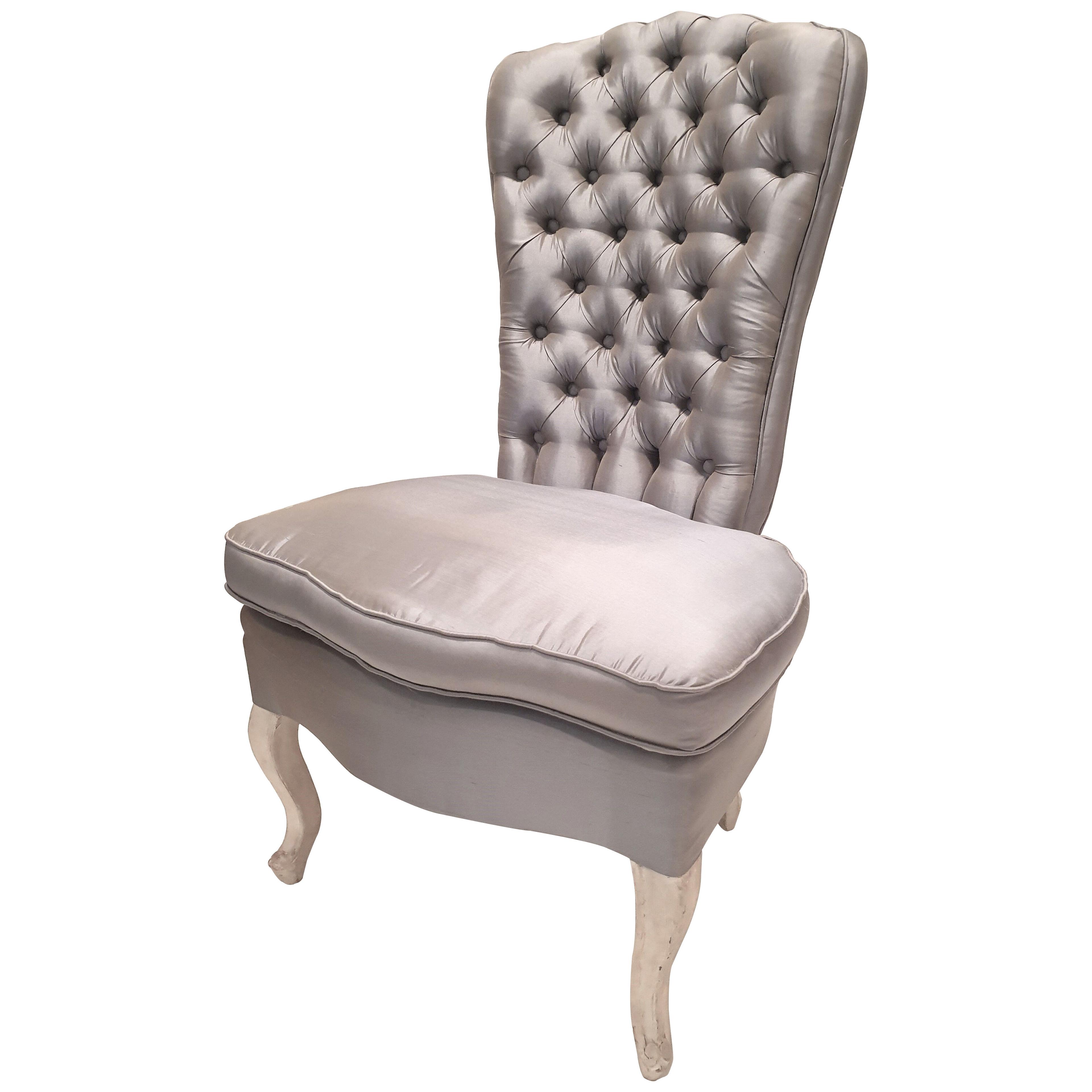 Shabby chic bedroom chair upholstered in silk.
