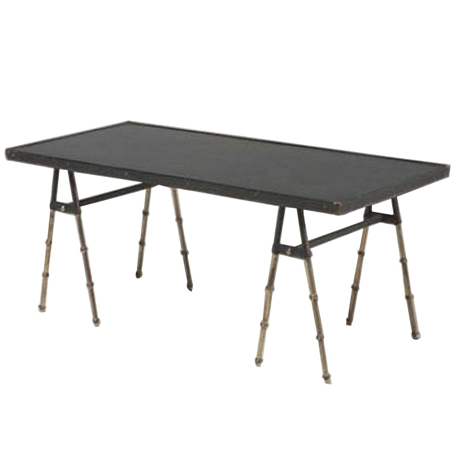 Mid Century Modern stitched leather and brass coffee table by Jacques Adnet.