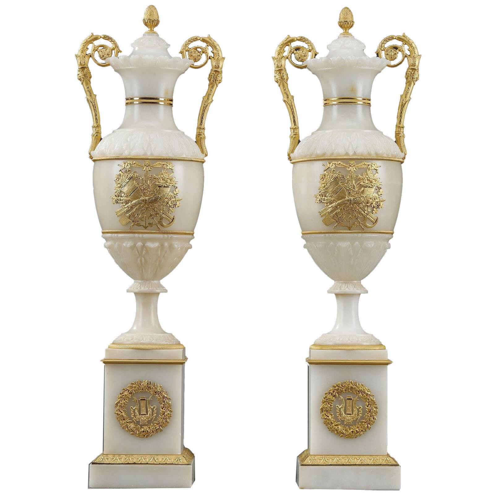 Pair of alabaster and gilt bronze covered vases
