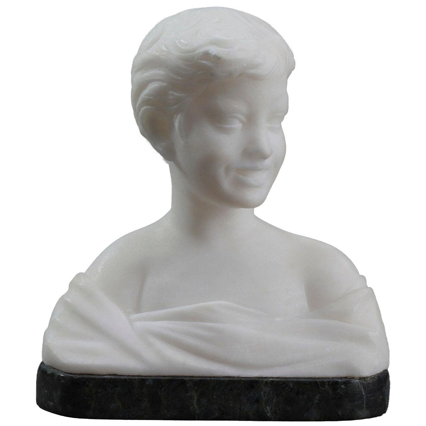 Small bust representing a young boy in alabaster