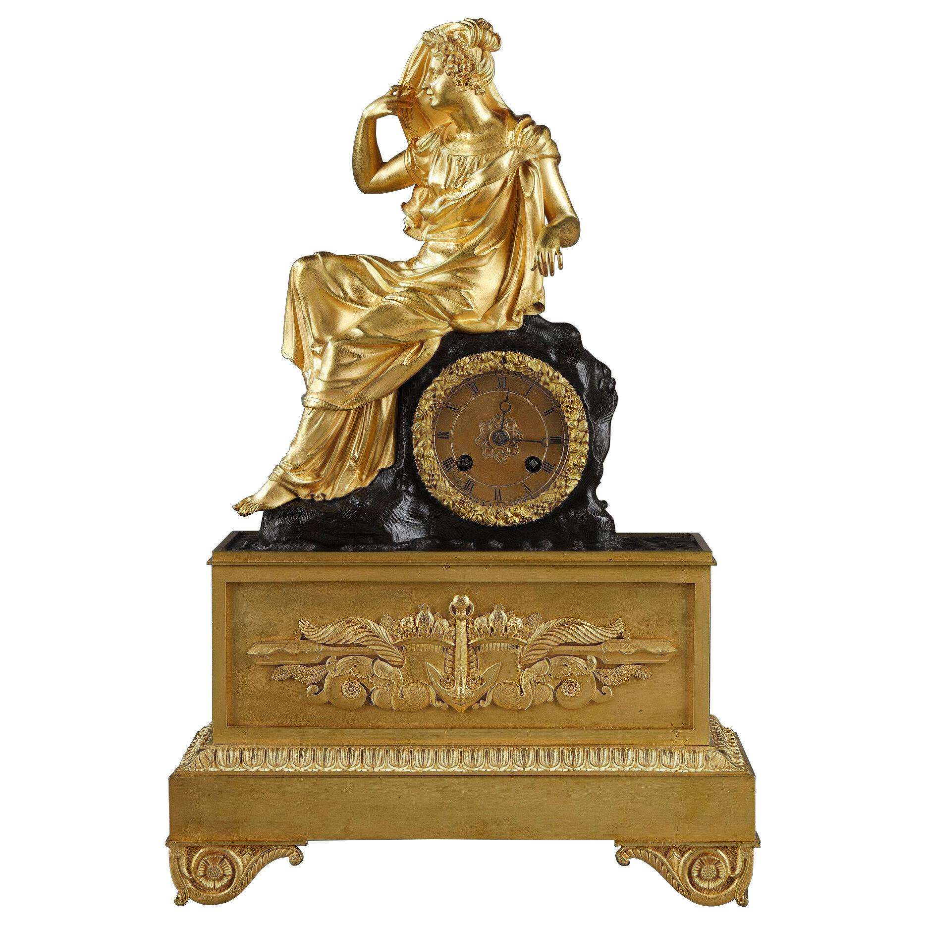 Restoration period Clock in gilt bronze with a young woman
