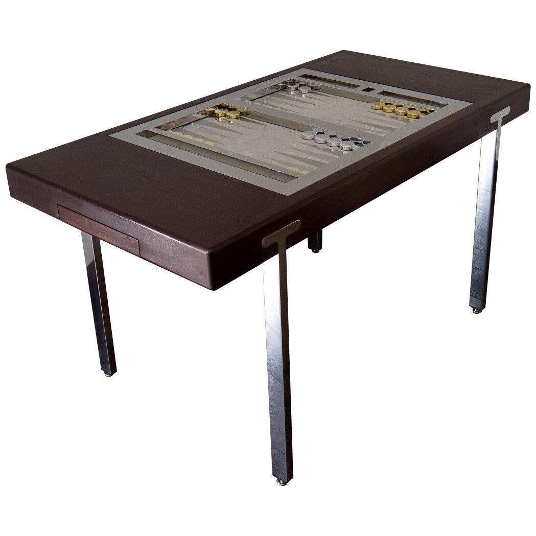 A Brown Polish and Nickel Tilt Top Backgammon Table