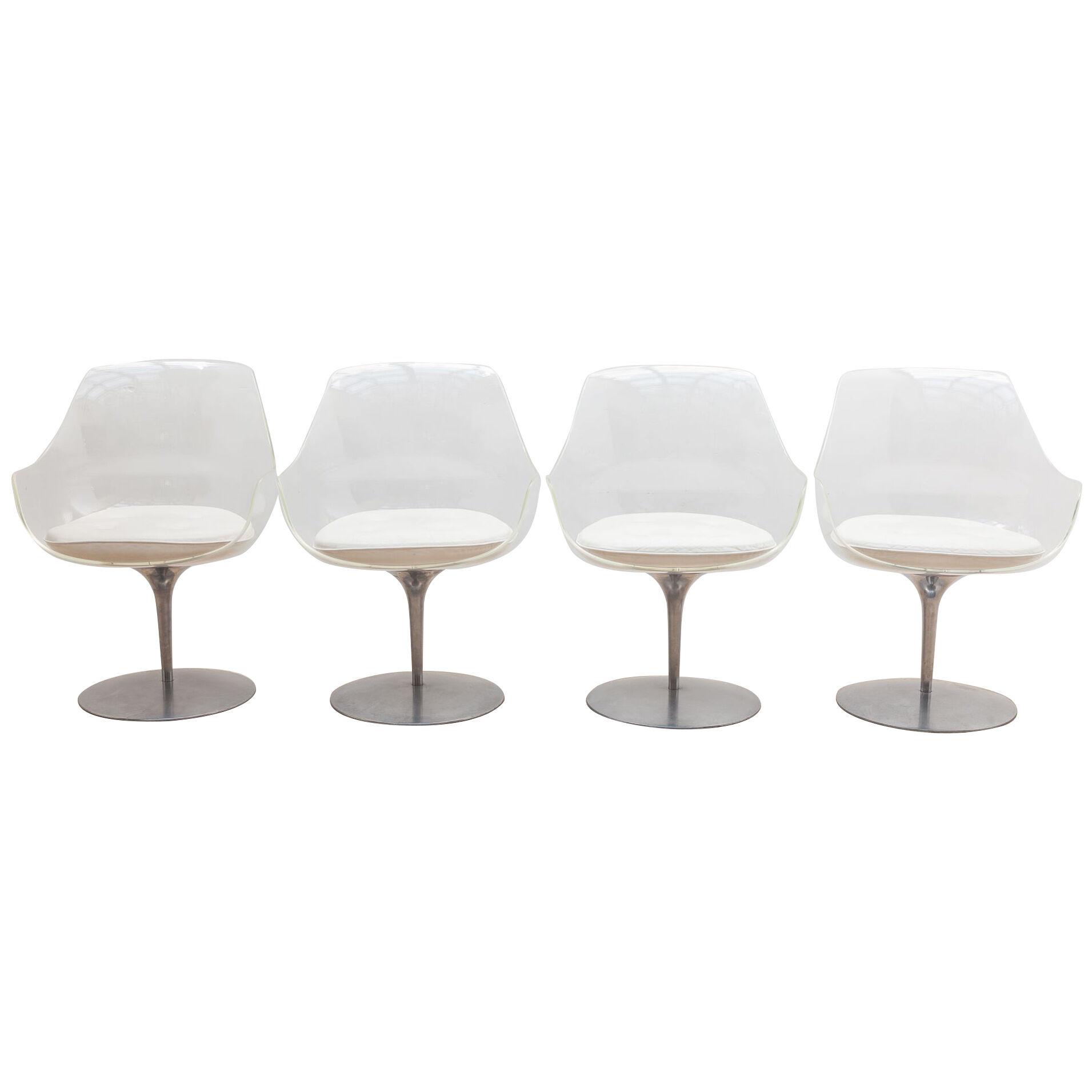 "Invisible Series" Set of Four Translucent Lucite Swivel Chairs by Laverne