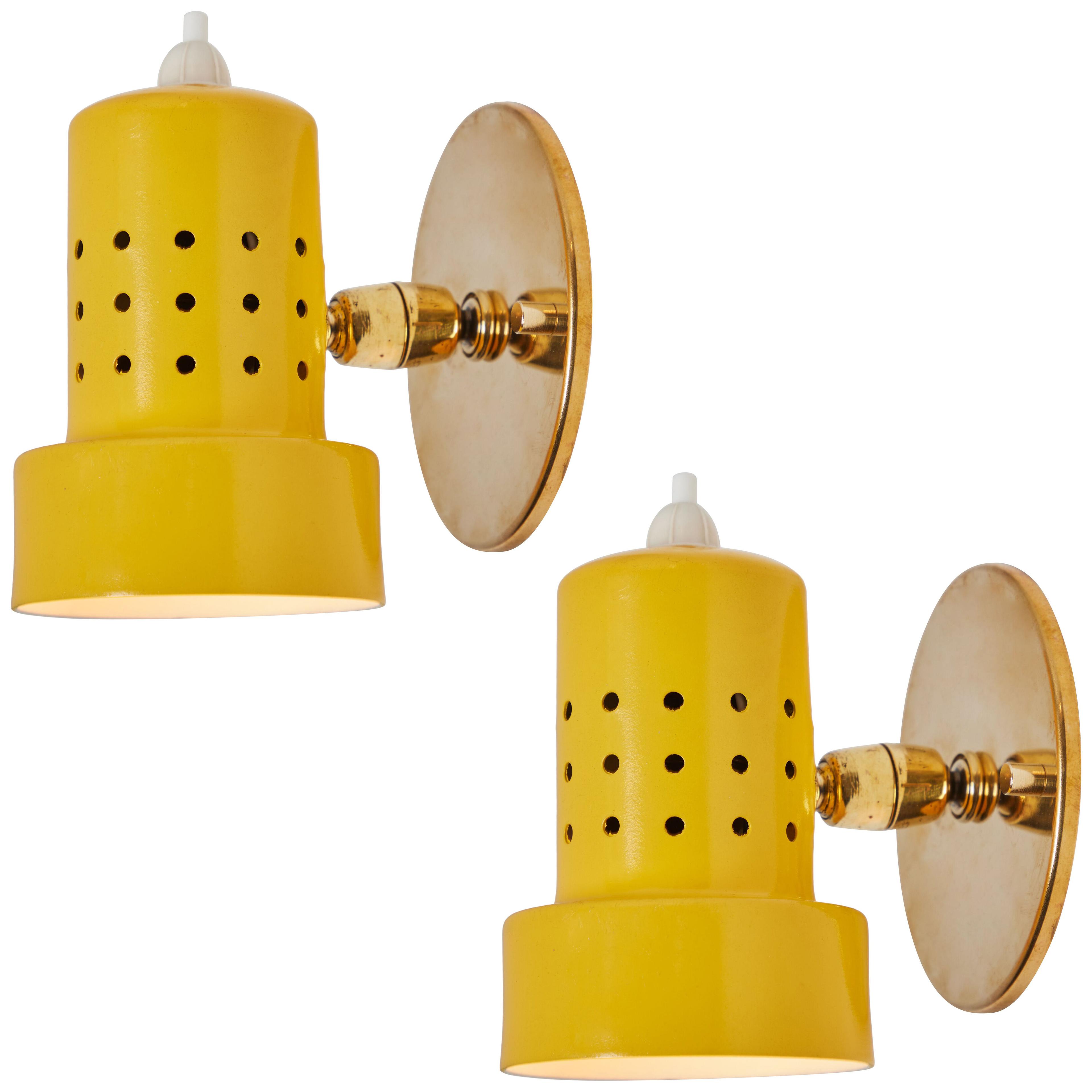 Pair of 1960s Stilux Milano Perforated Yellow Articulating Sconces