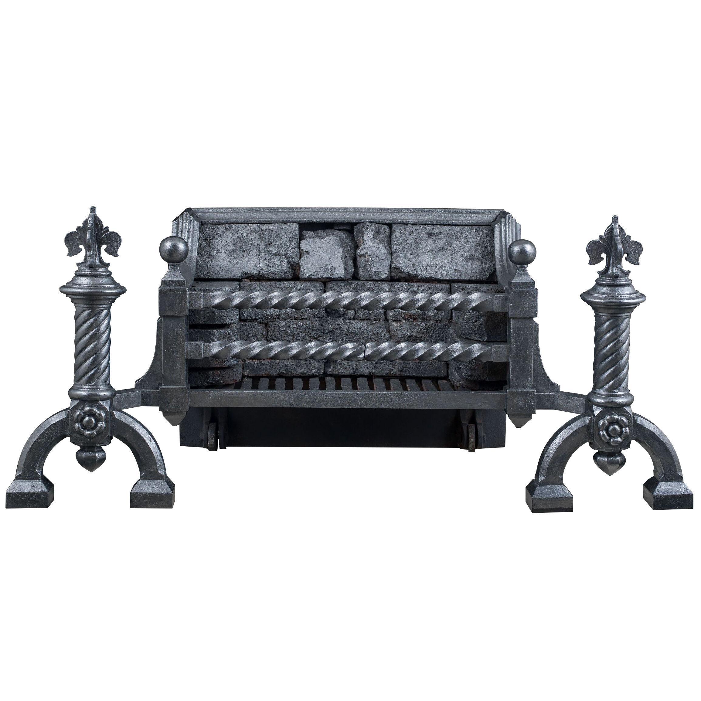 A large cast iron Gothic Revival fire grate