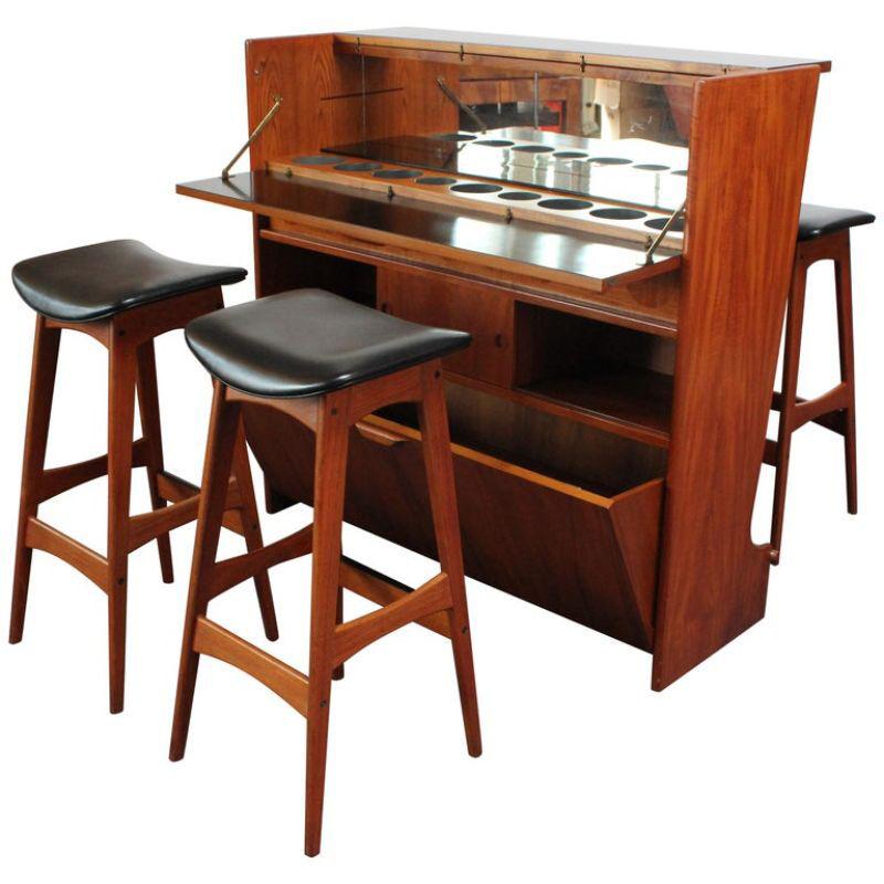 Danish Modern Teak Bar Cabinet and Four Leather Stools by Johannes Andersen