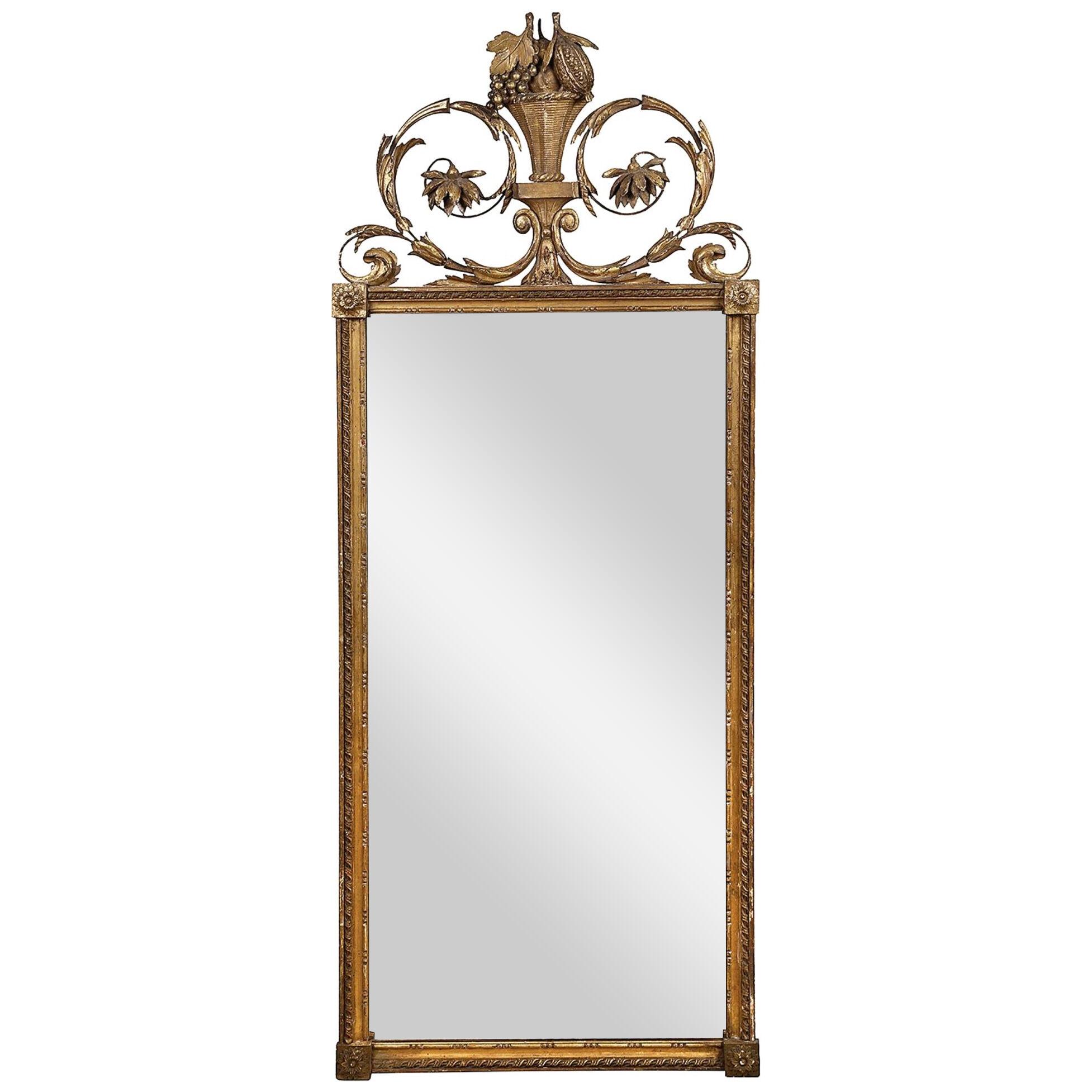 Early 19th Century French giltwood wall mirror.