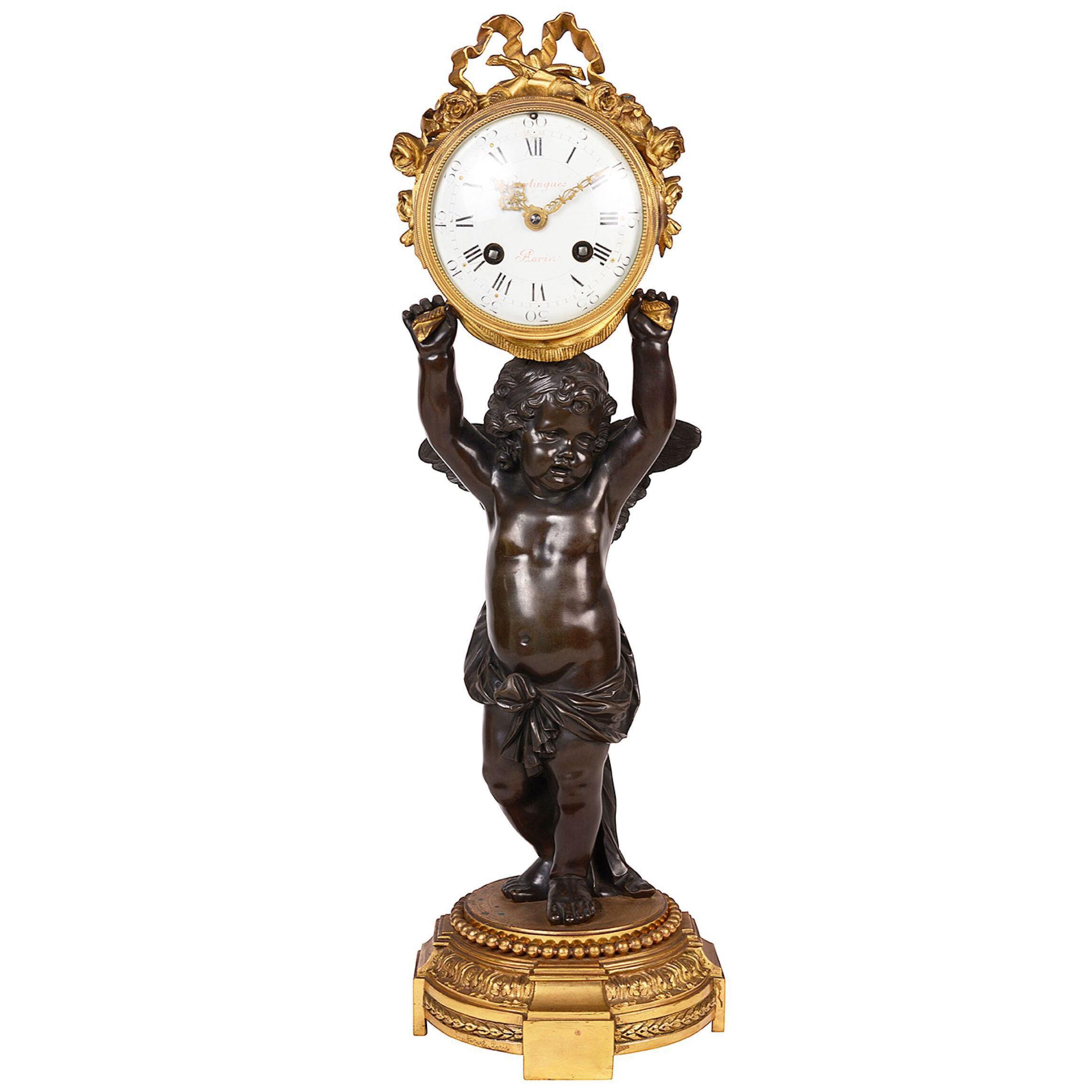A classical French bronze & ormolu striking mantel clock