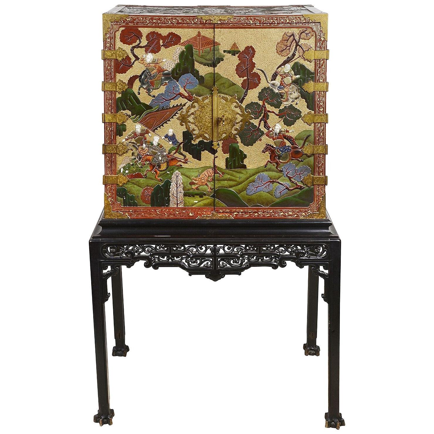 Late 19th Century Chinese Export lacquer cabinet on stand.