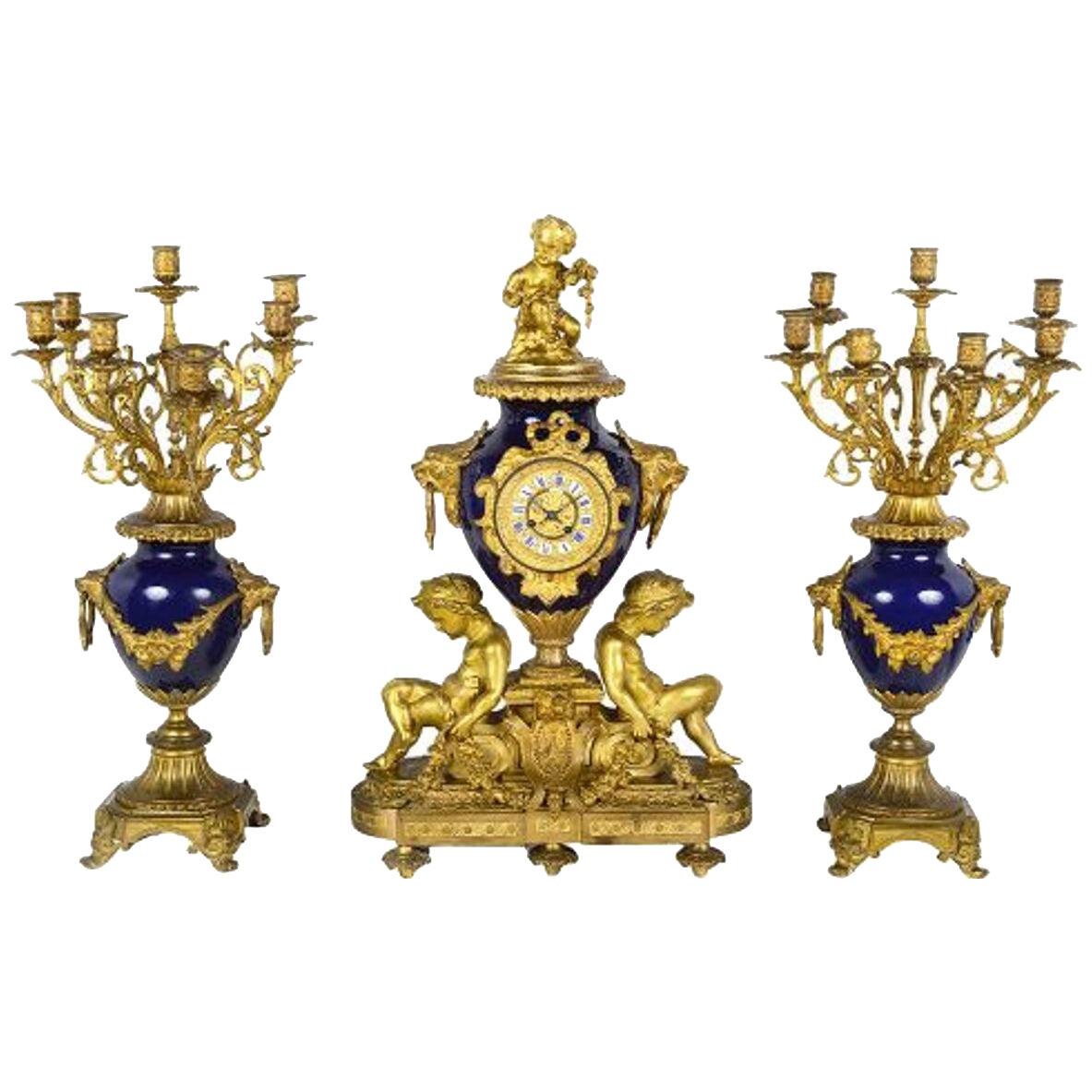 French 19th Century ormolu and porcelain clock set.