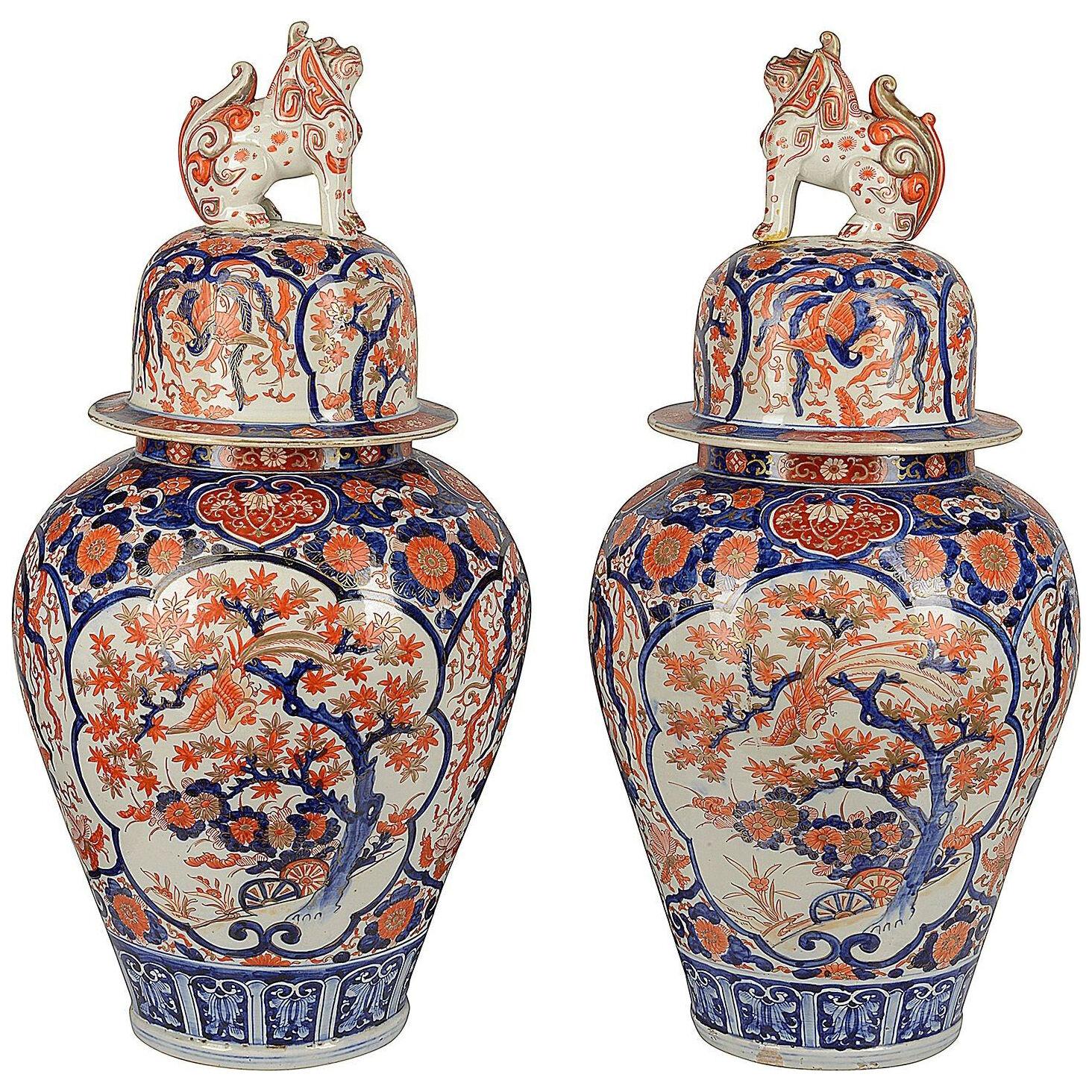 Impressive pair 19th Century Imari lidded vases.