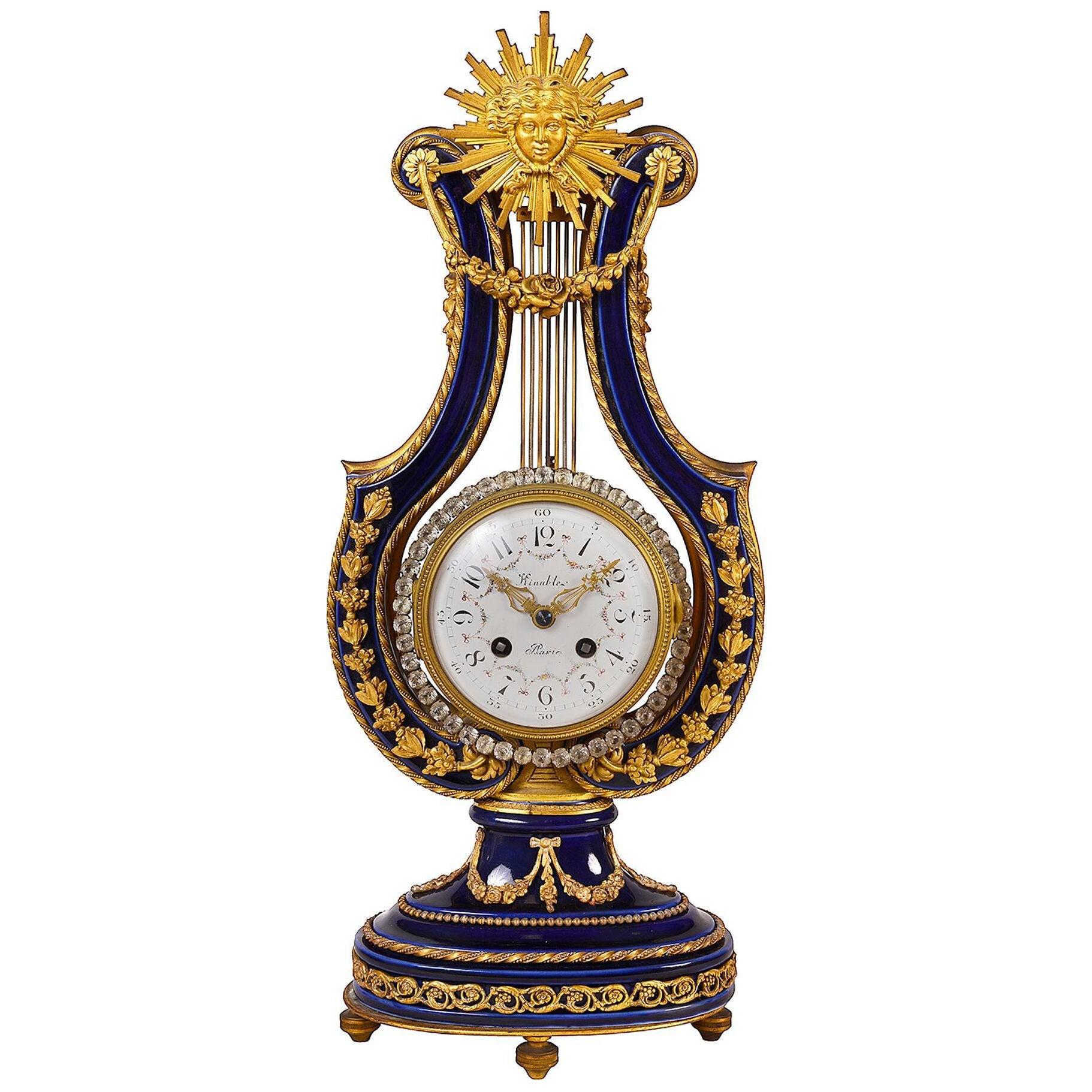 A French Sevres style porcelain and ormolu-mounted lyre clock