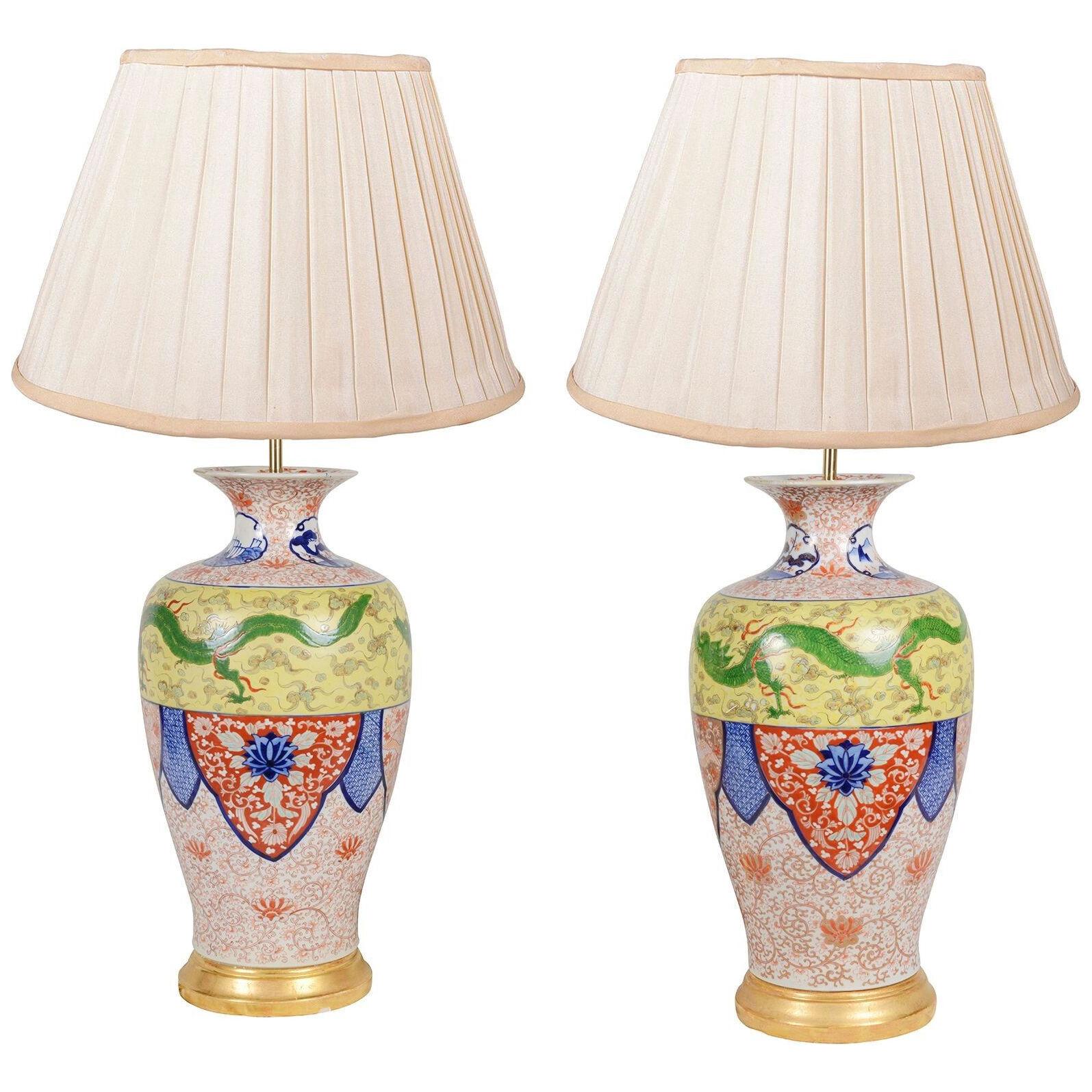 Impressive pair 19th Century Imari lidded vases.