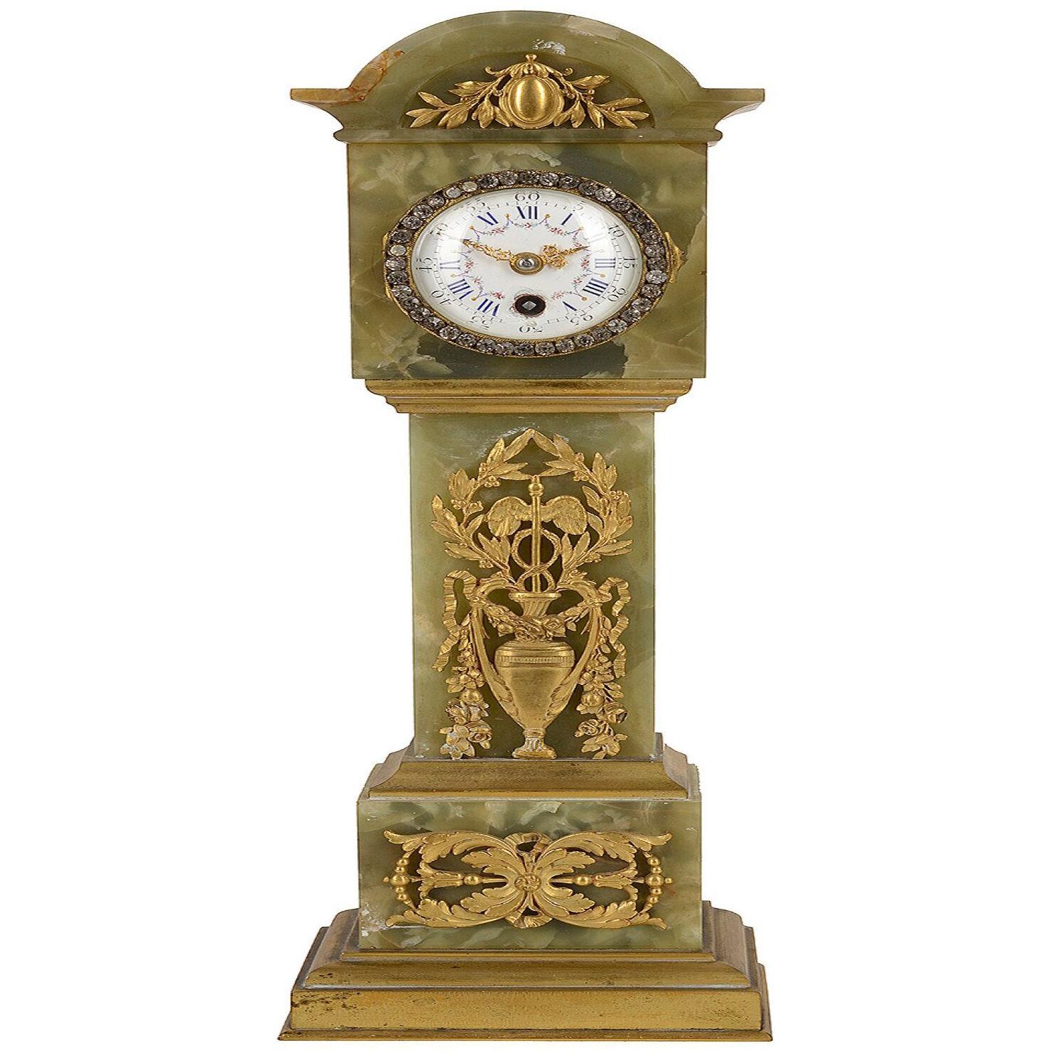 Minature Onyx + Ormolu table/mantel clock. late 19th Century.