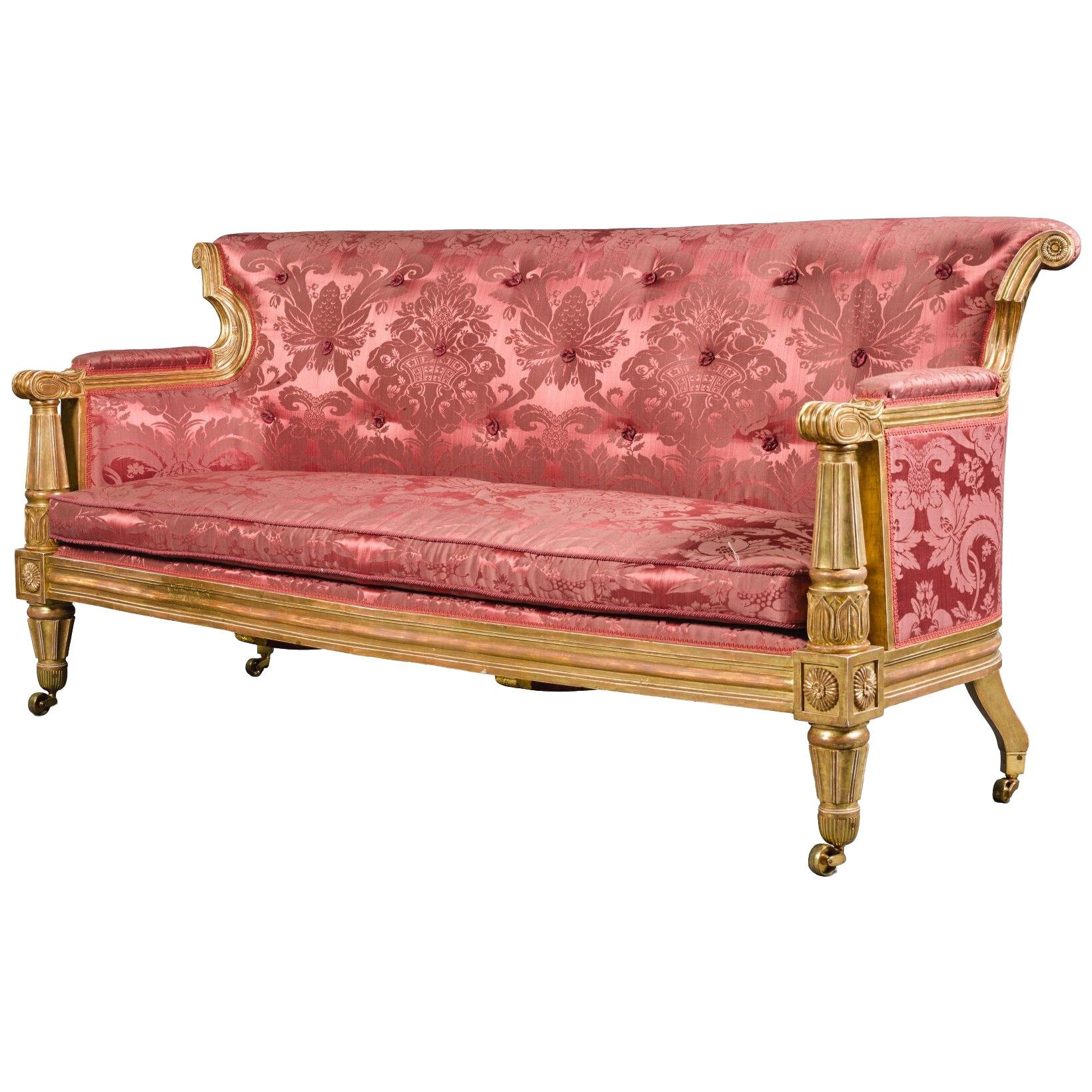A ROYAL CARVED GILTWOOD SOFA, TO DESIGNS BY GEORGE SMITH, STAMPED WINDSOR CASTLE