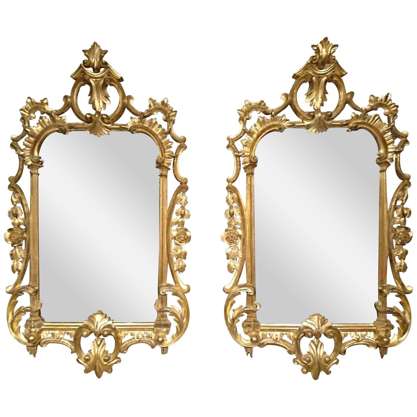 Pair of early 19th century carved and giltwood wall mirrors