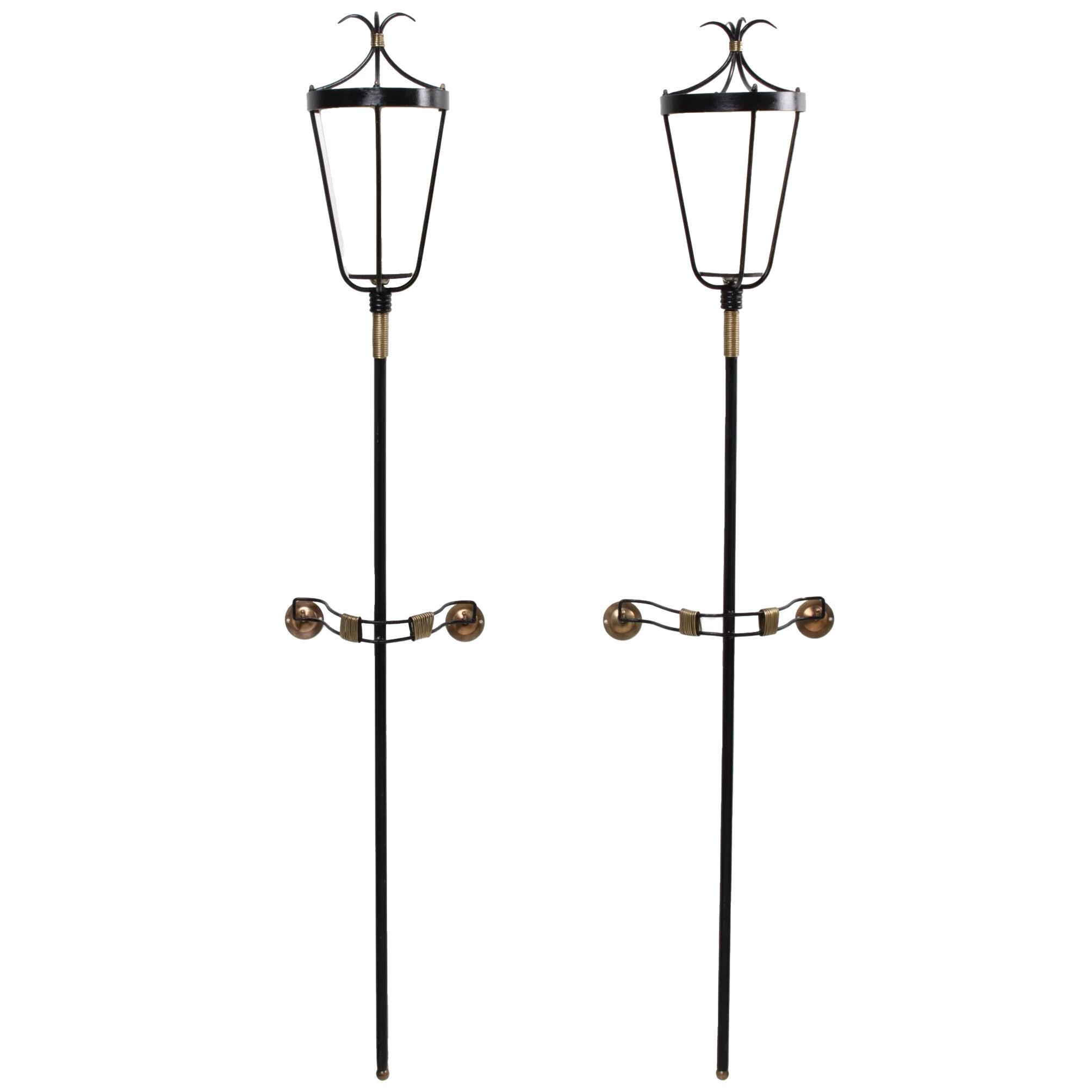 Pair of wrought iron wall torchieres – France