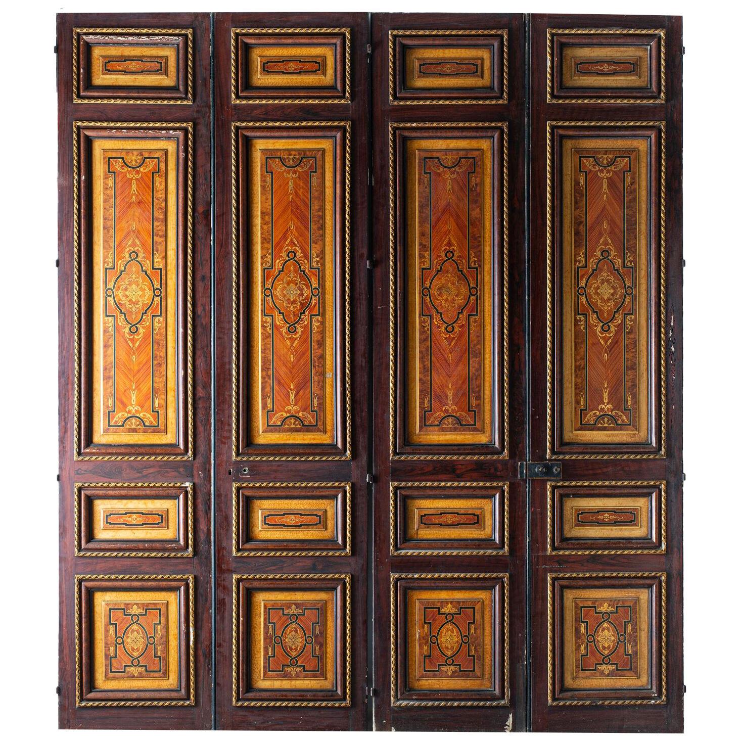 Three pairs of 19th century oak double-doors painted in imitation of marquetry