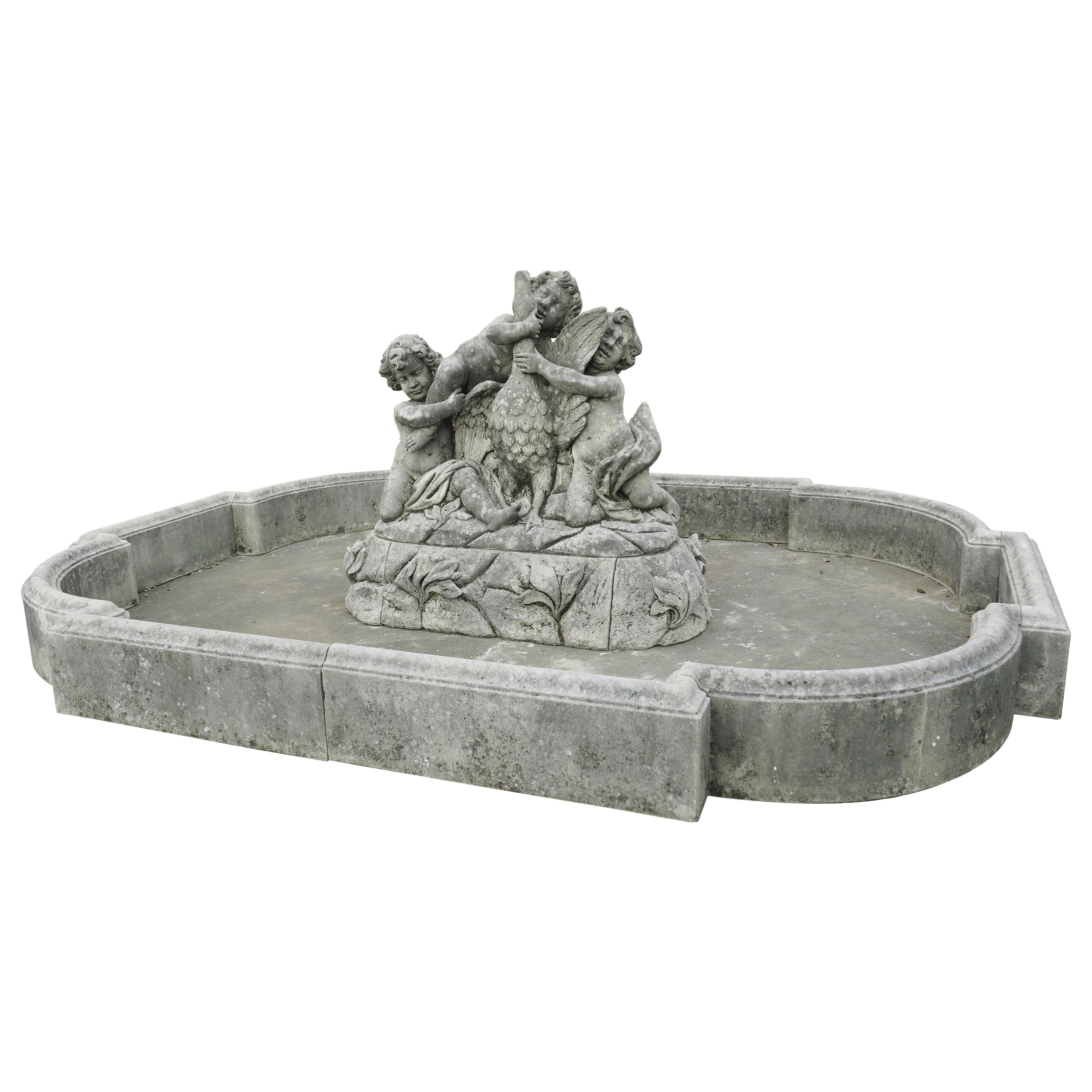 Grand Italian Limestone Center Fountain with Putti and Goose Water Feature
