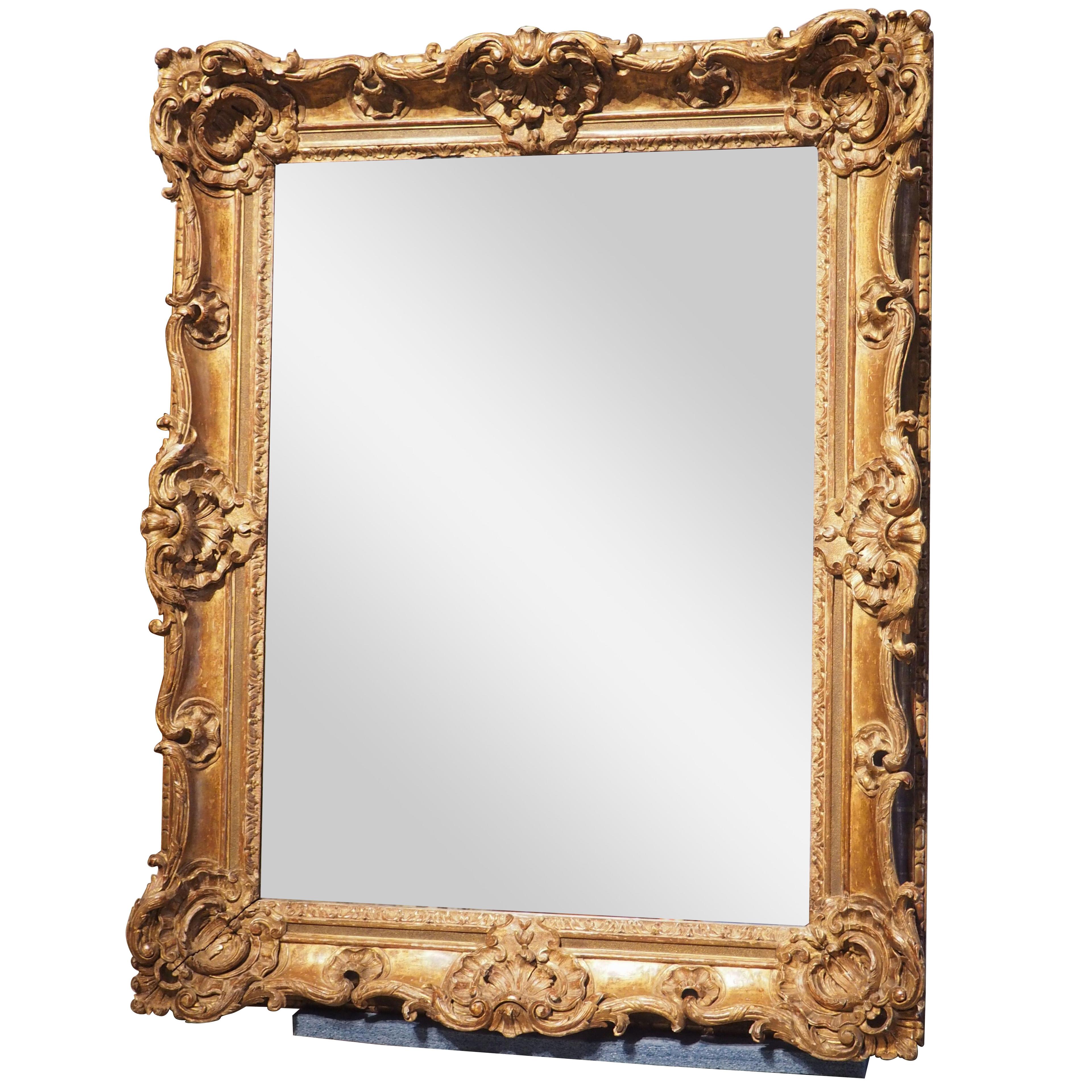Richly Carved French Oak Louis XV Giltwood Mirror