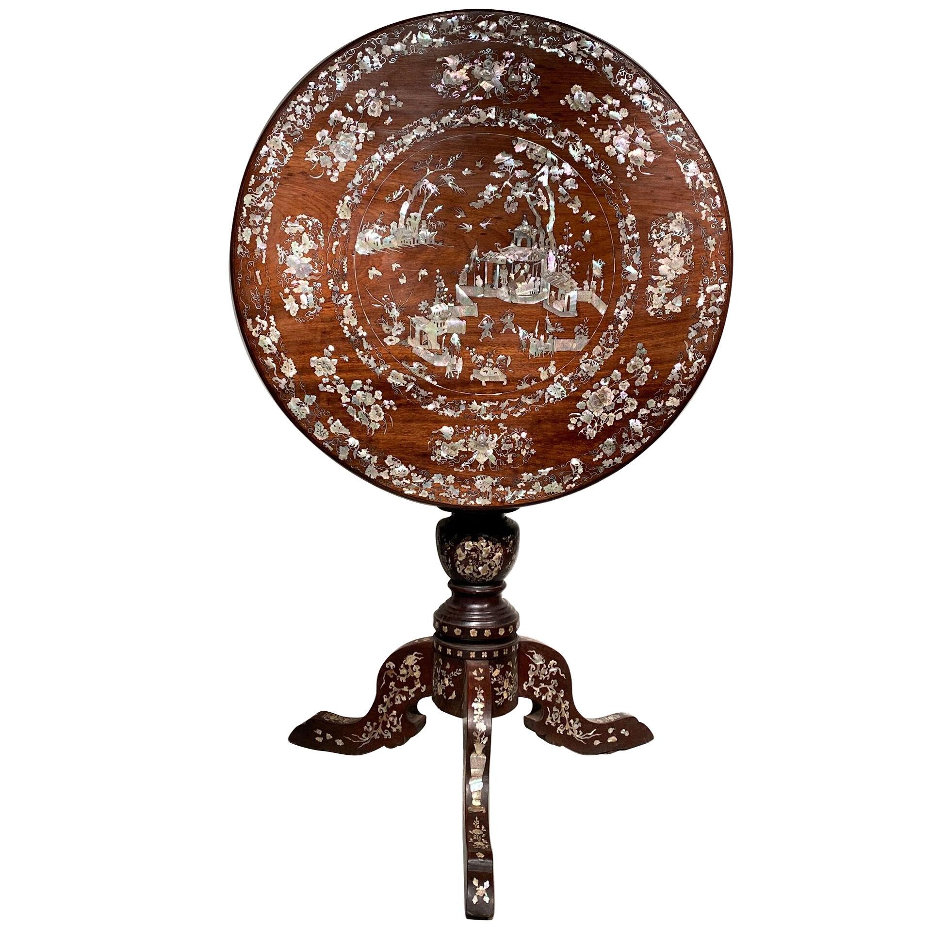 An Anglo-Chinese birdcage tripod table with mother-of-pearl inlay.
