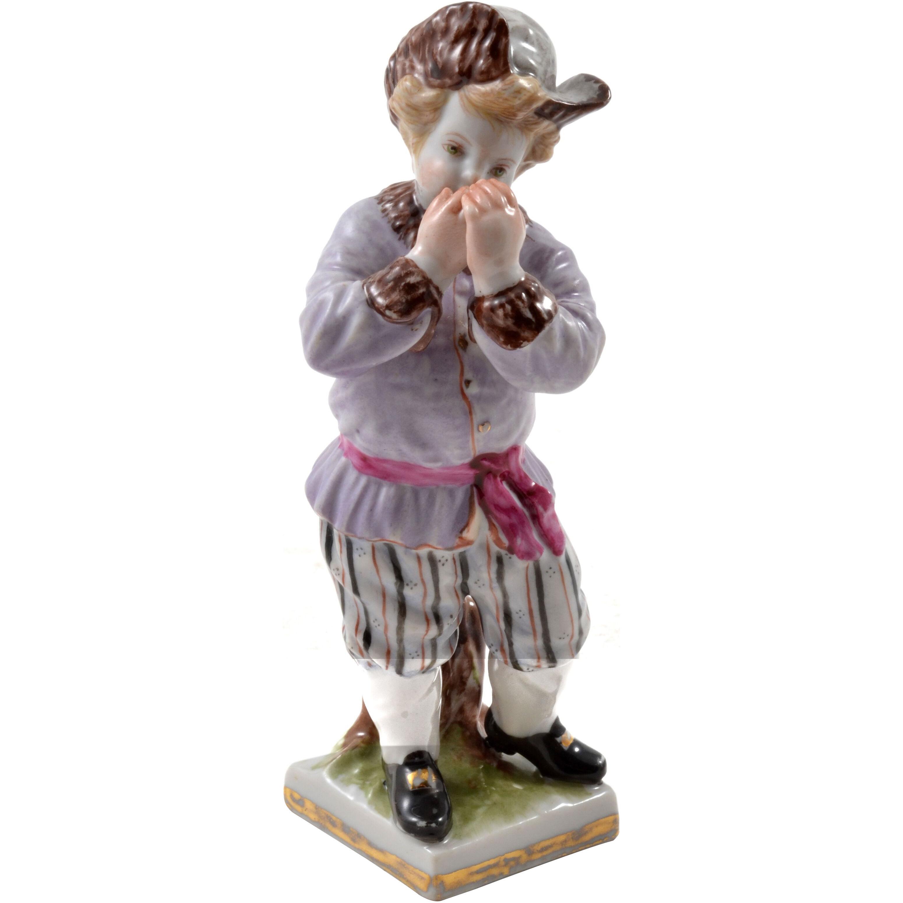 Figurine of a Boy with a Hat. Meissen Hand Painted Porcelain Germany