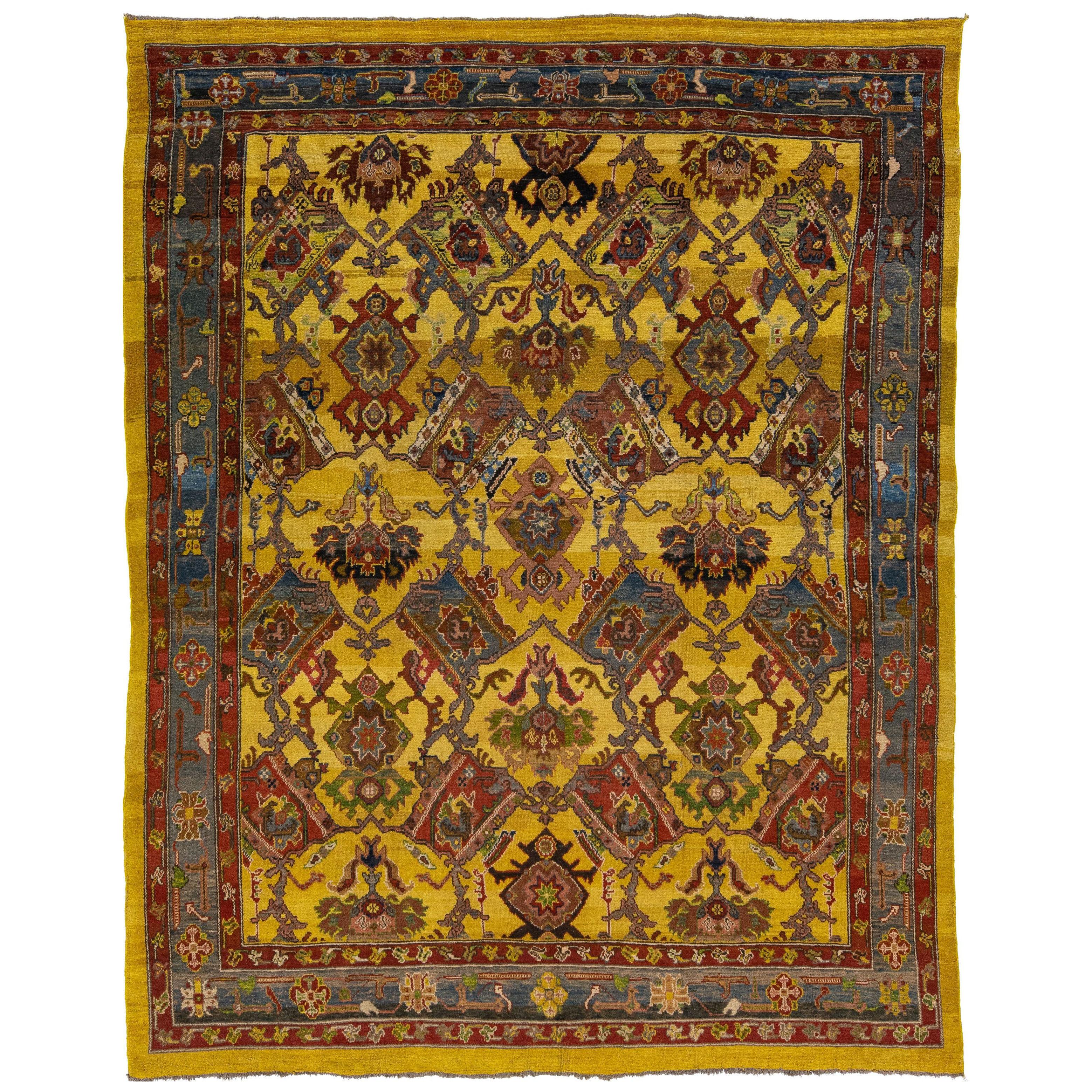Vintage Persian Bakshaish Handmade Yellow Wool Rug with Tribal Pattern