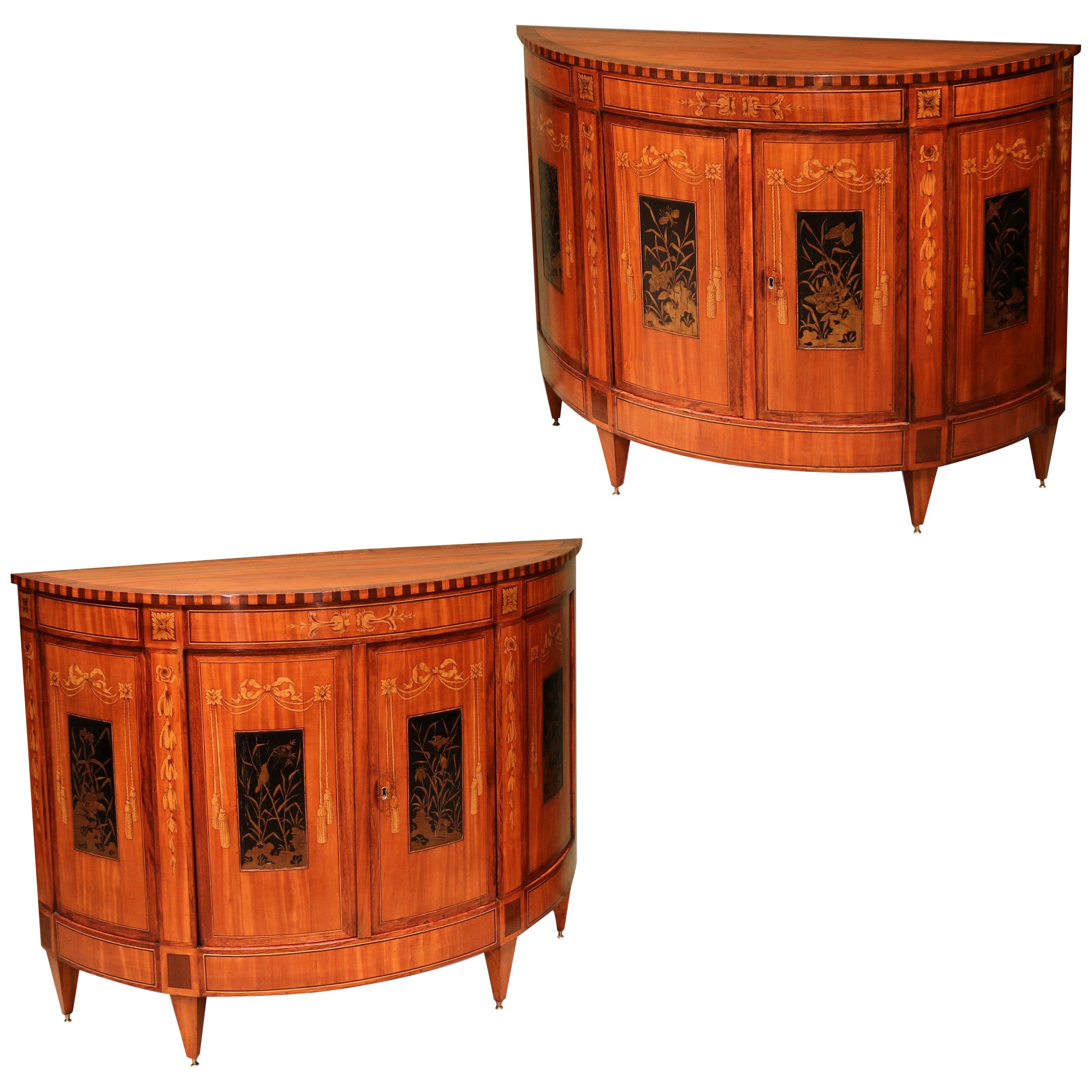 A pair of early 19th century Continental satinwood commodes