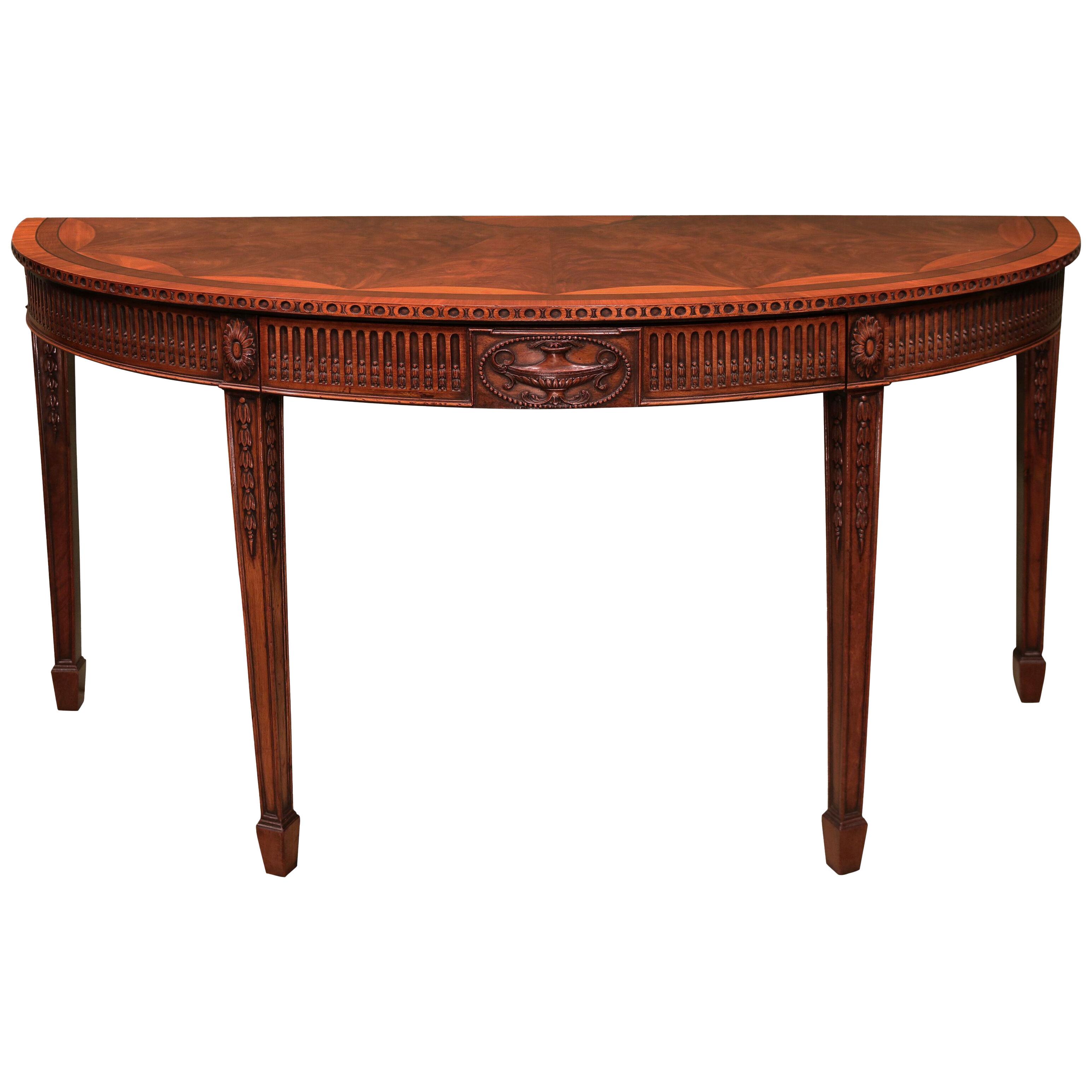 A 19th century Chippendale revival mahogany semi - elliptical serving table