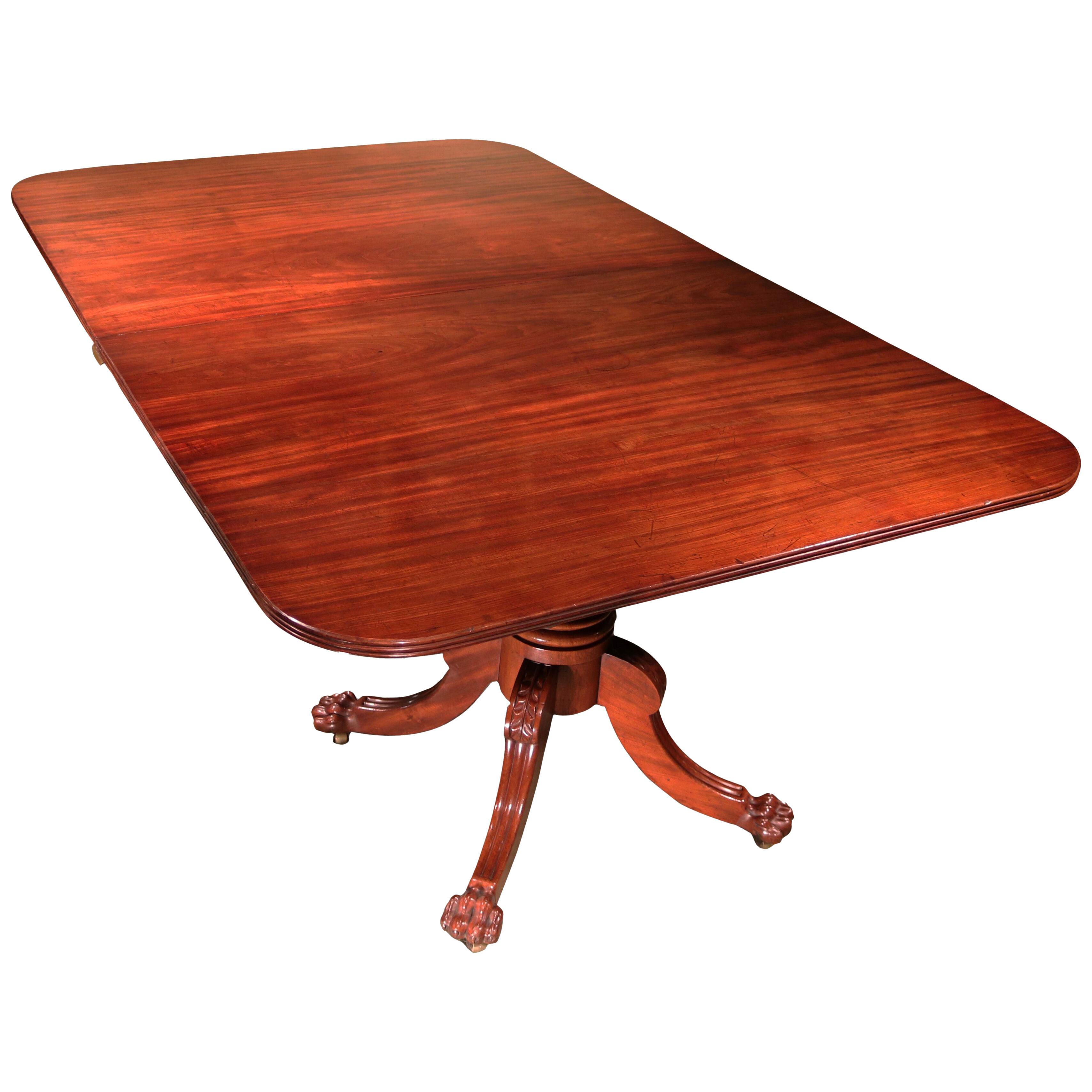 A Regency period mahogany two pillar dining table