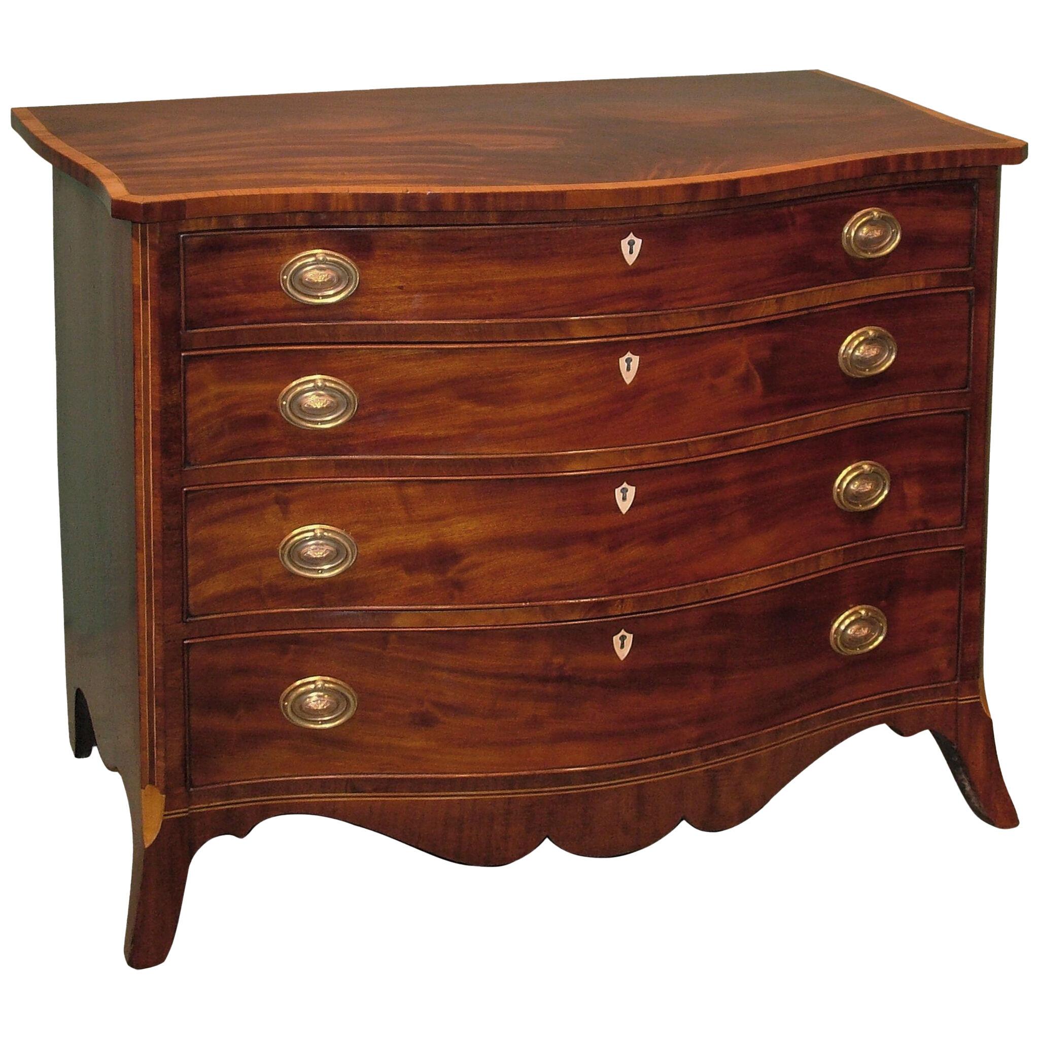 A Mid-18th Century George III Period Mahogany Serpentine Chest of Drawers