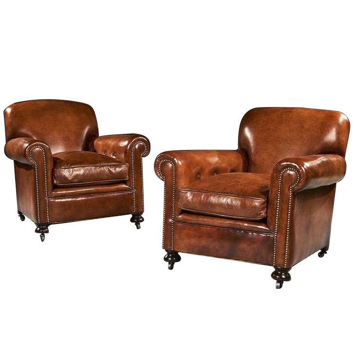 Pair of Antique Leather Club Armchairs on Bun Feet