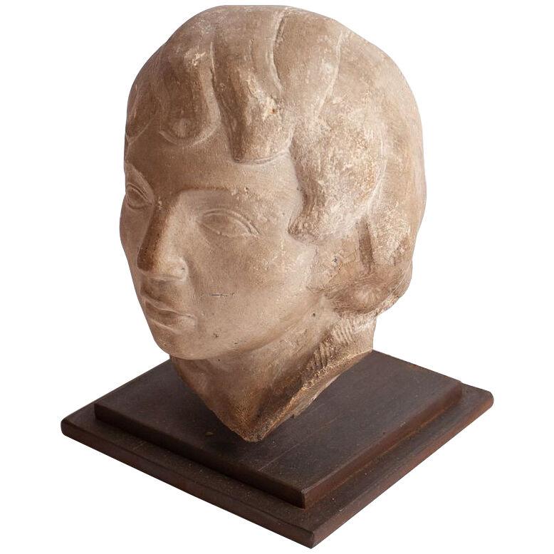 Stone Bust of Young Boy