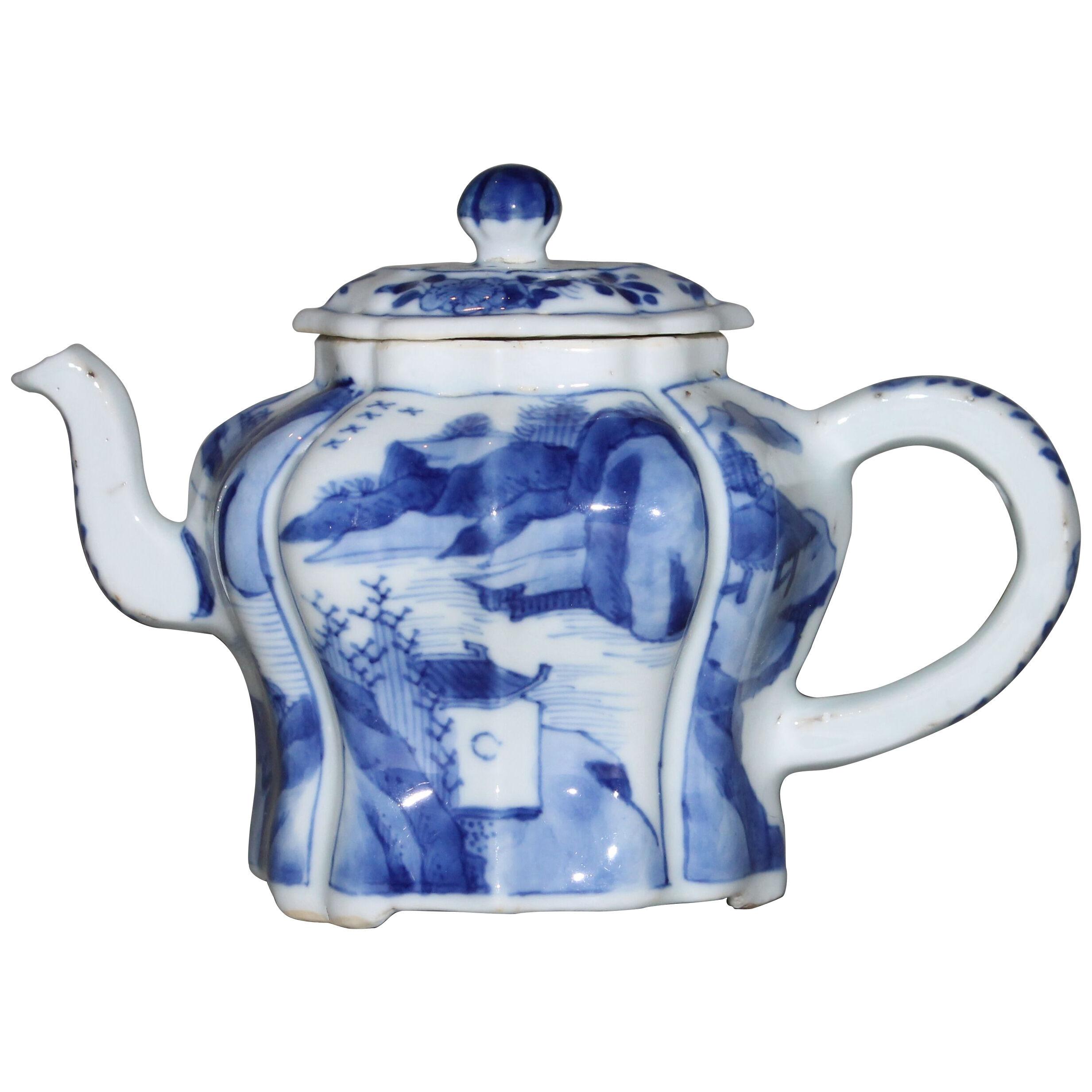 A Chinese porcelain blue and white lobed teapot and cover