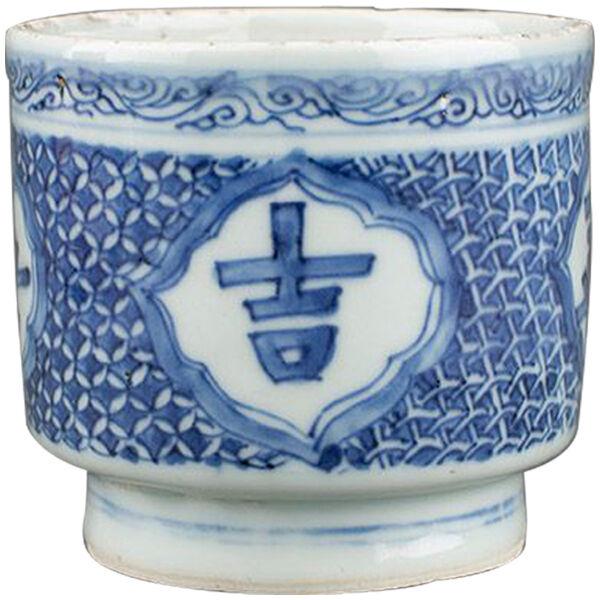 Blue and white tea bowl of cylindrical form on a tall foot