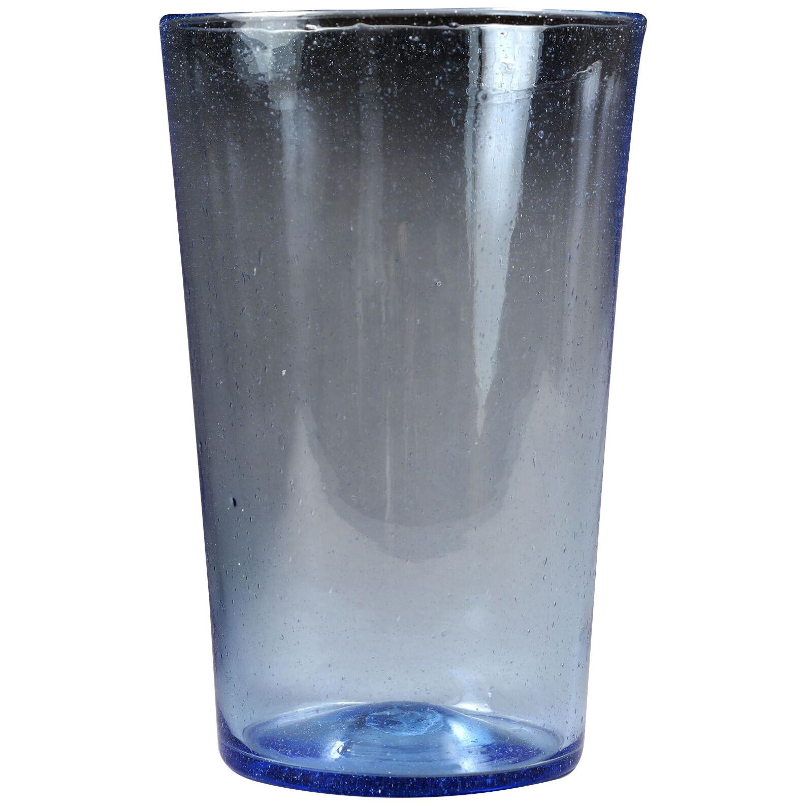 A sapphire blue glass bucket vase