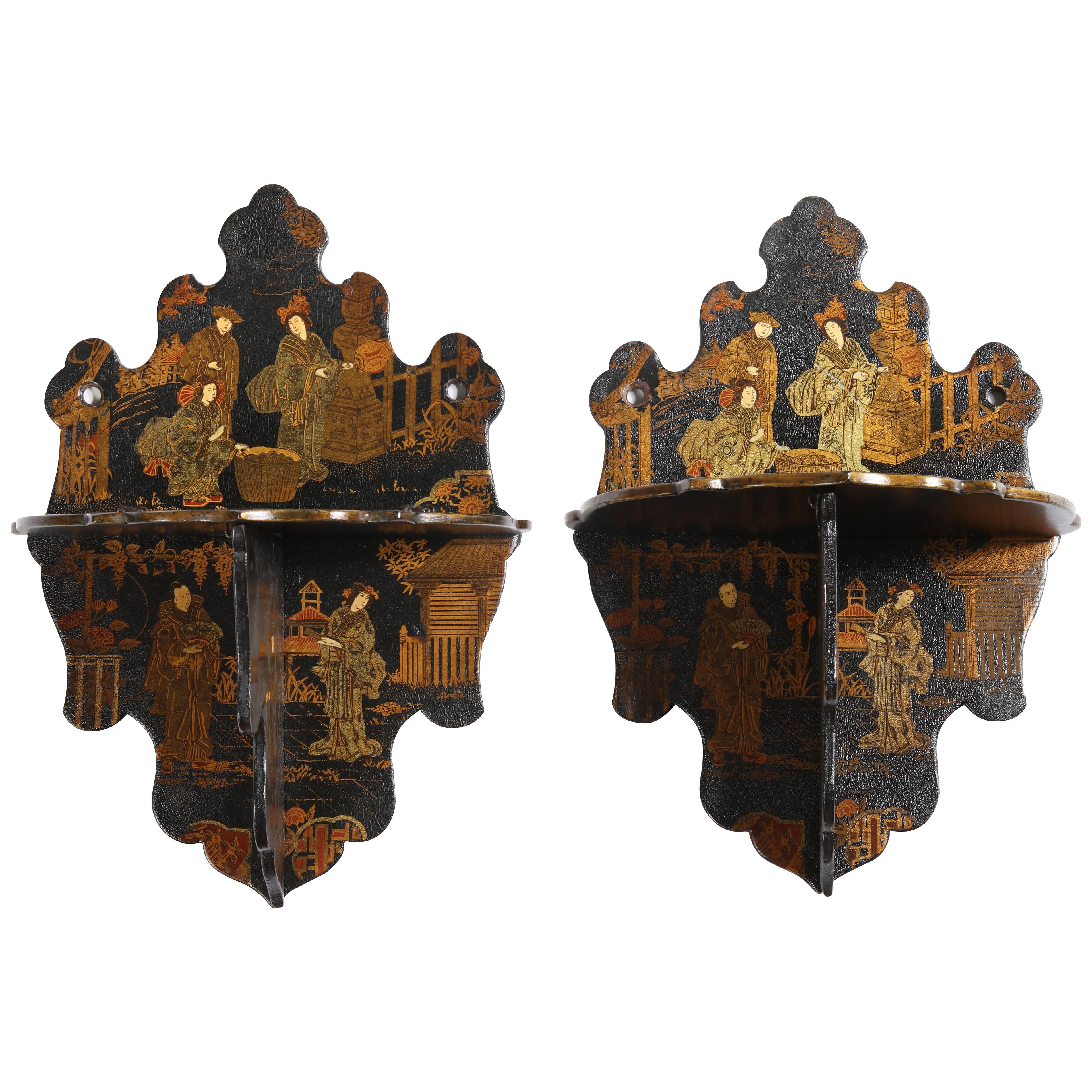 A pair of lacquer brackets