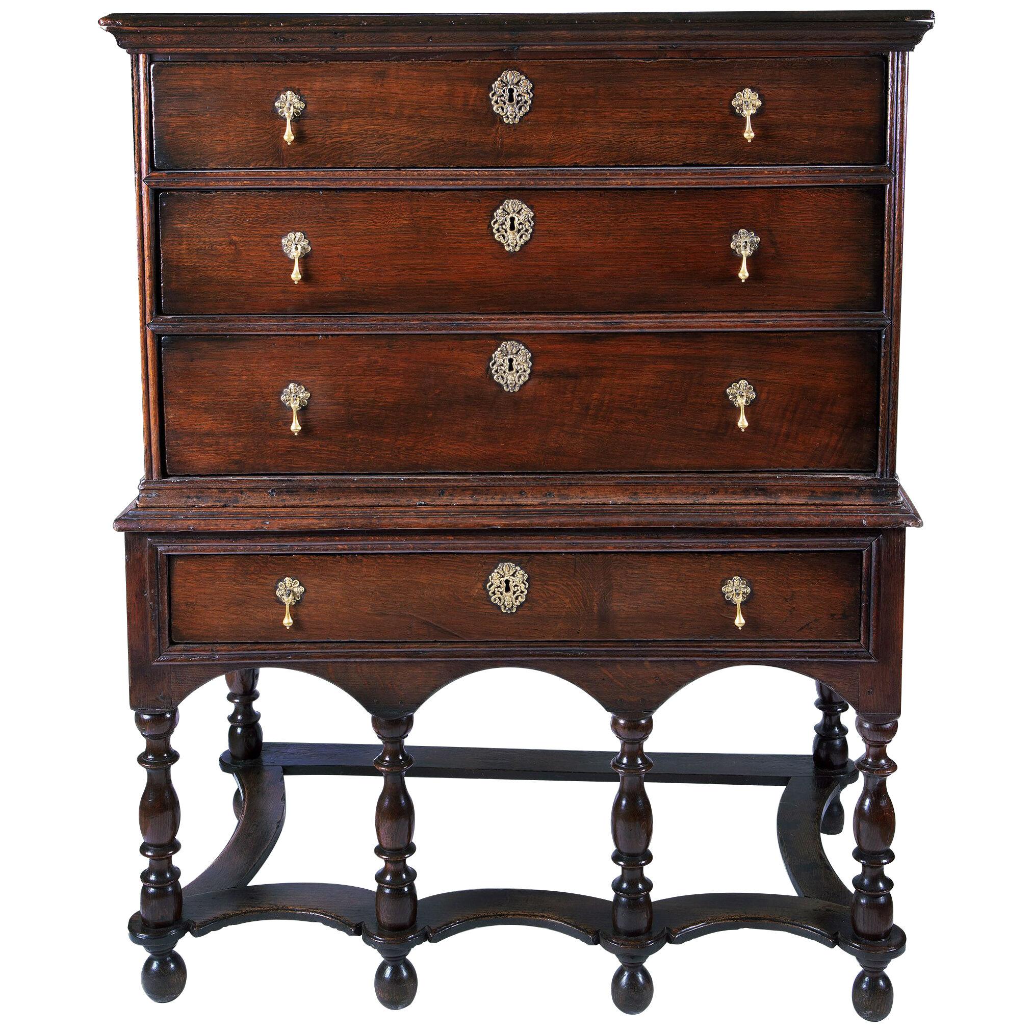 An early 18th century oak chest on stand