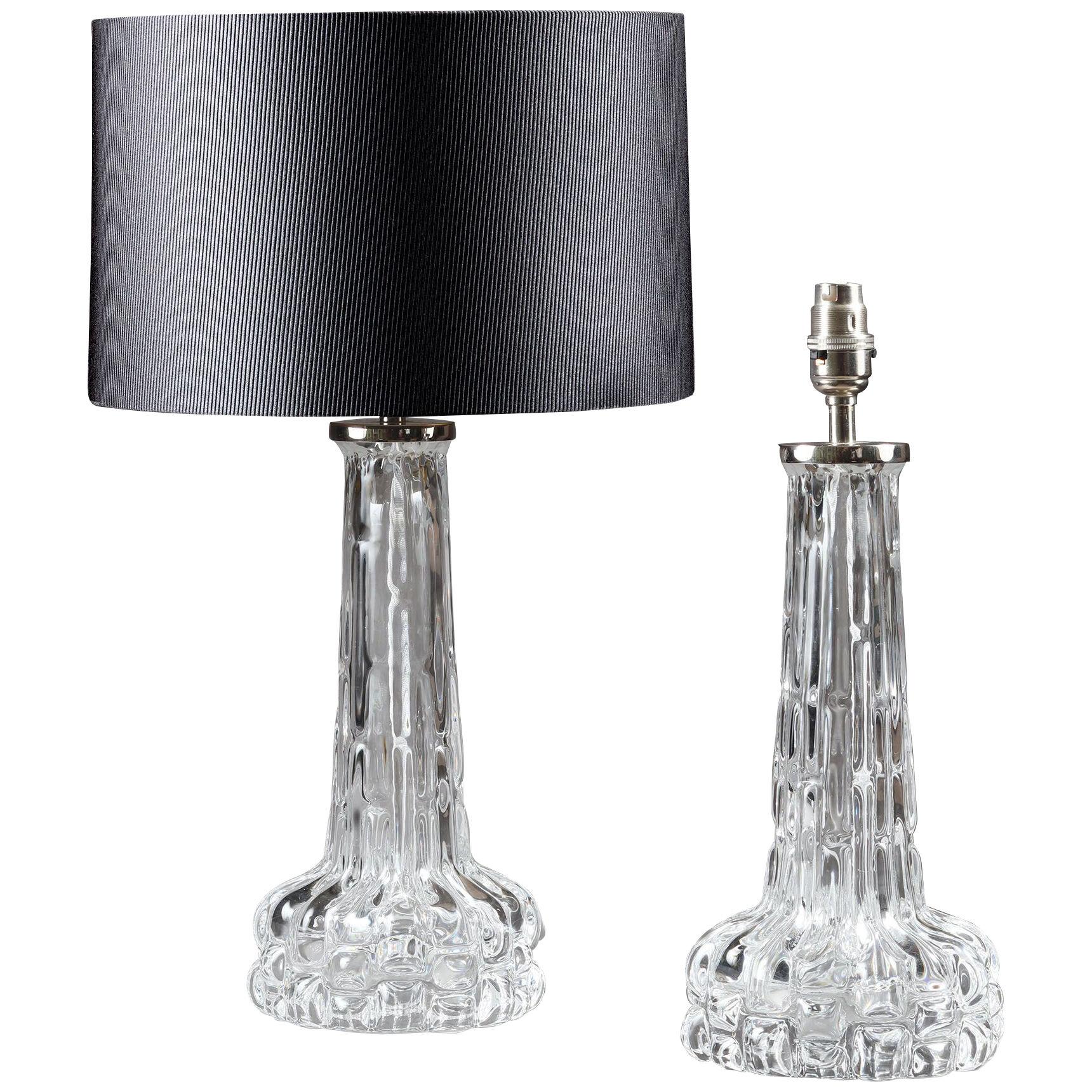 A pair of glass lamps by Orrefors
