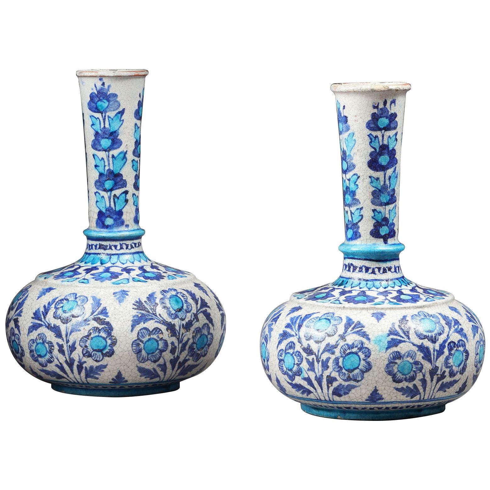 A near pair of Indian pottery vases