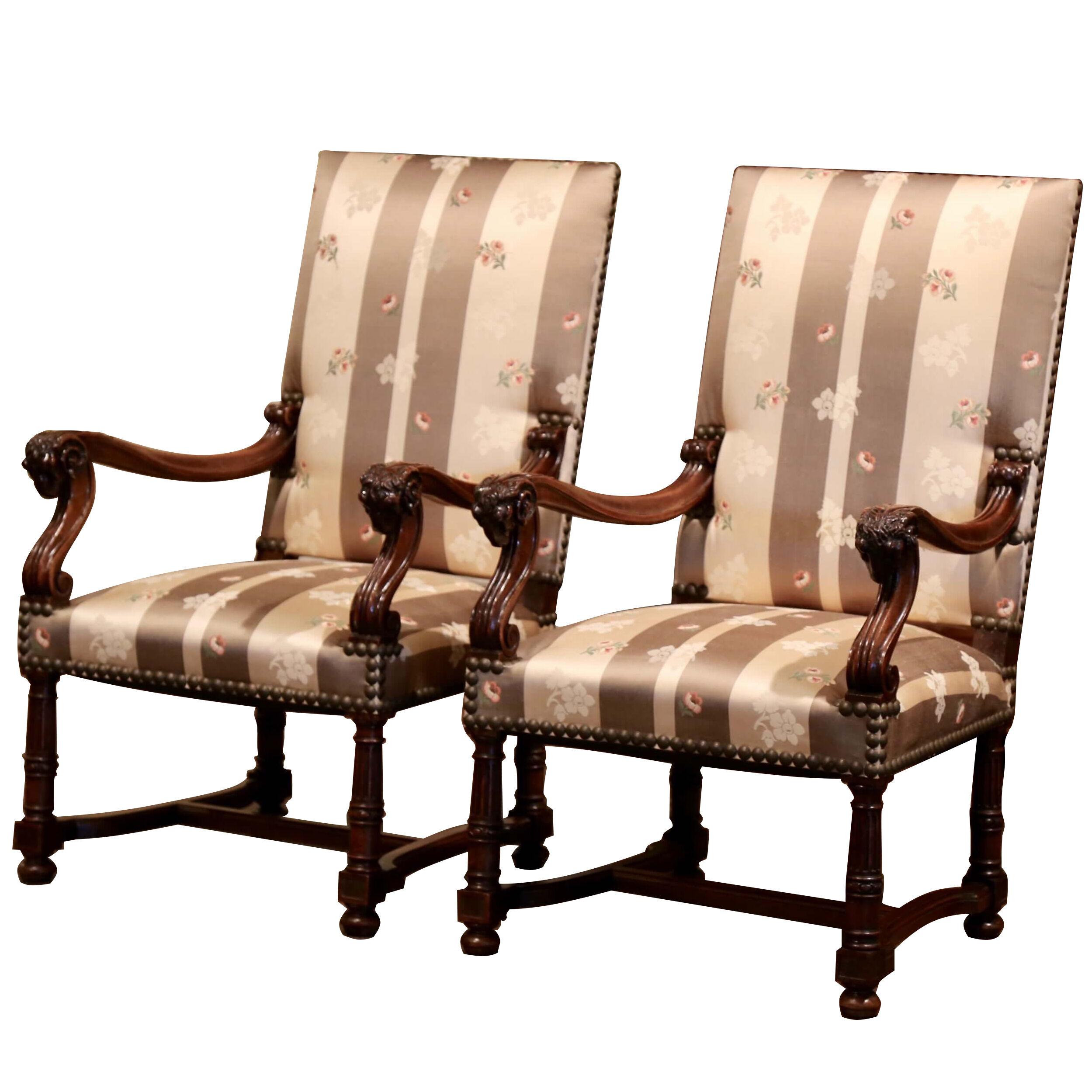 Pair of 19th Century French Louis XIII Carved Walnut Armchairs with Ram Decor