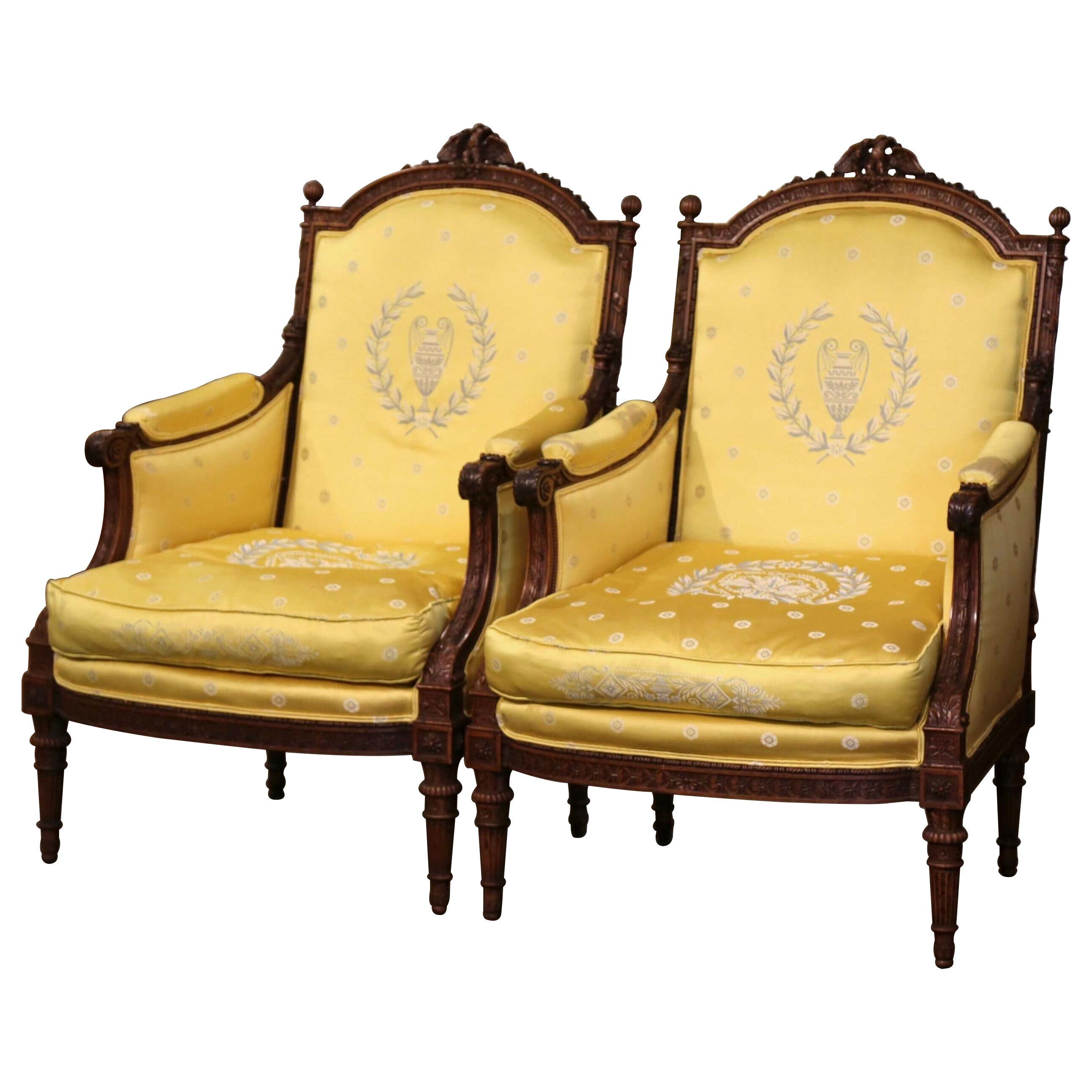 Pair of 19th Century French Louis XVI Carved Walnut Winged Armchairs