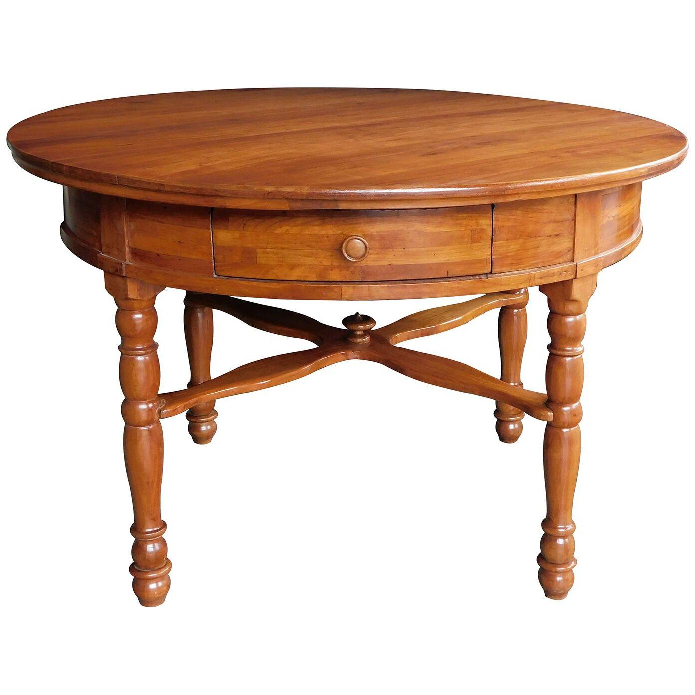 Large Swiss cherrywood single-drawer circular center table