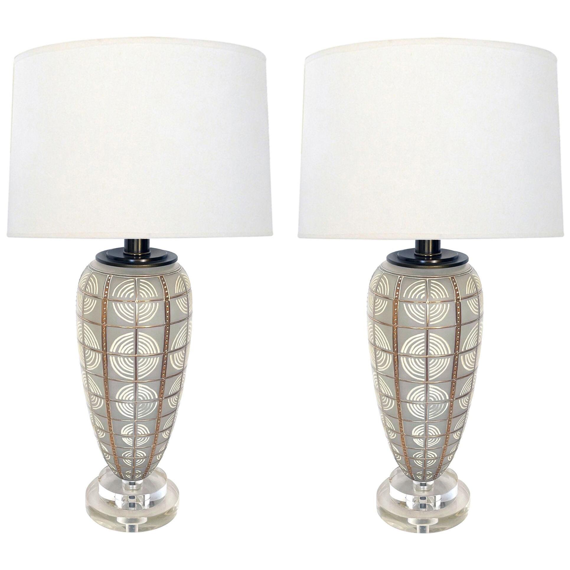 Pair of 1960's frosted torpedo-form lamps with applied decoration
