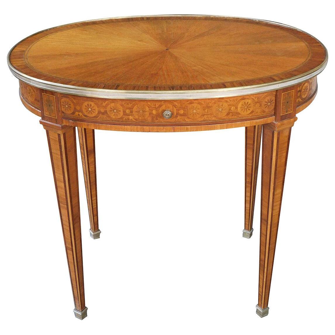 French Louis XVI style marquetry mahogany single-drawer oval side table