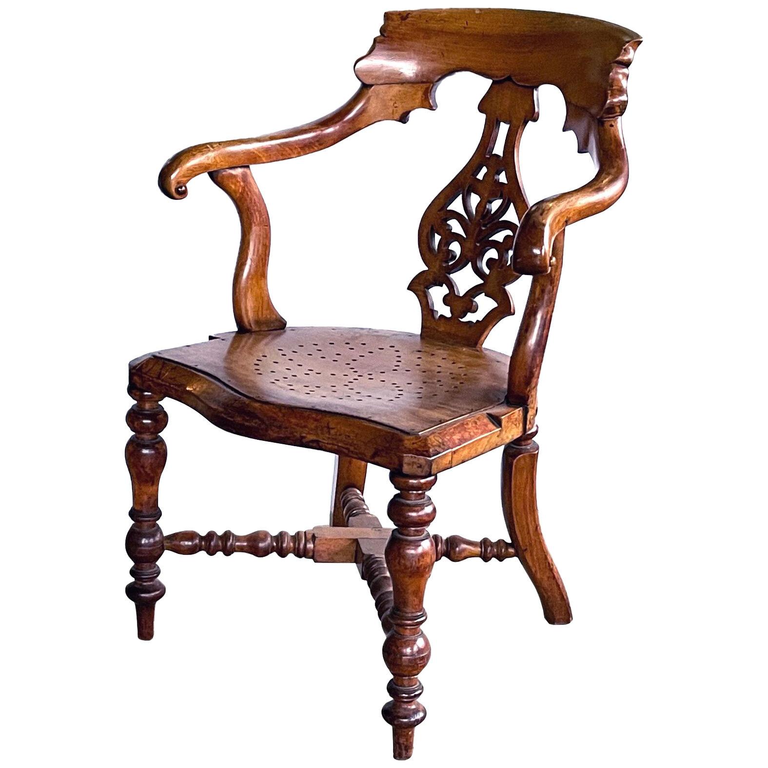 A Handsome English Yew Wood Captain's Chair