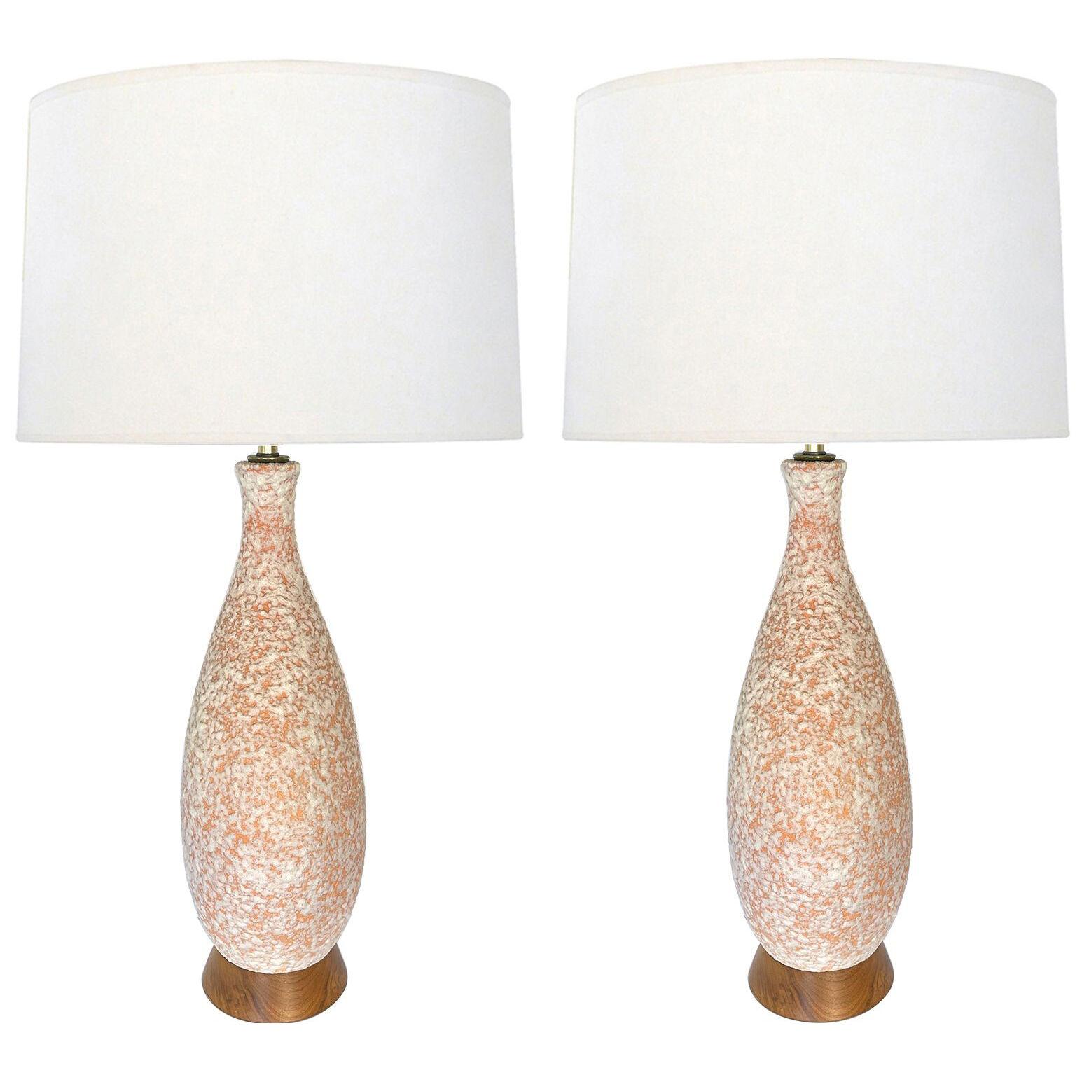 Pair of 1960's peach and white lava glaze bottle-form lamps