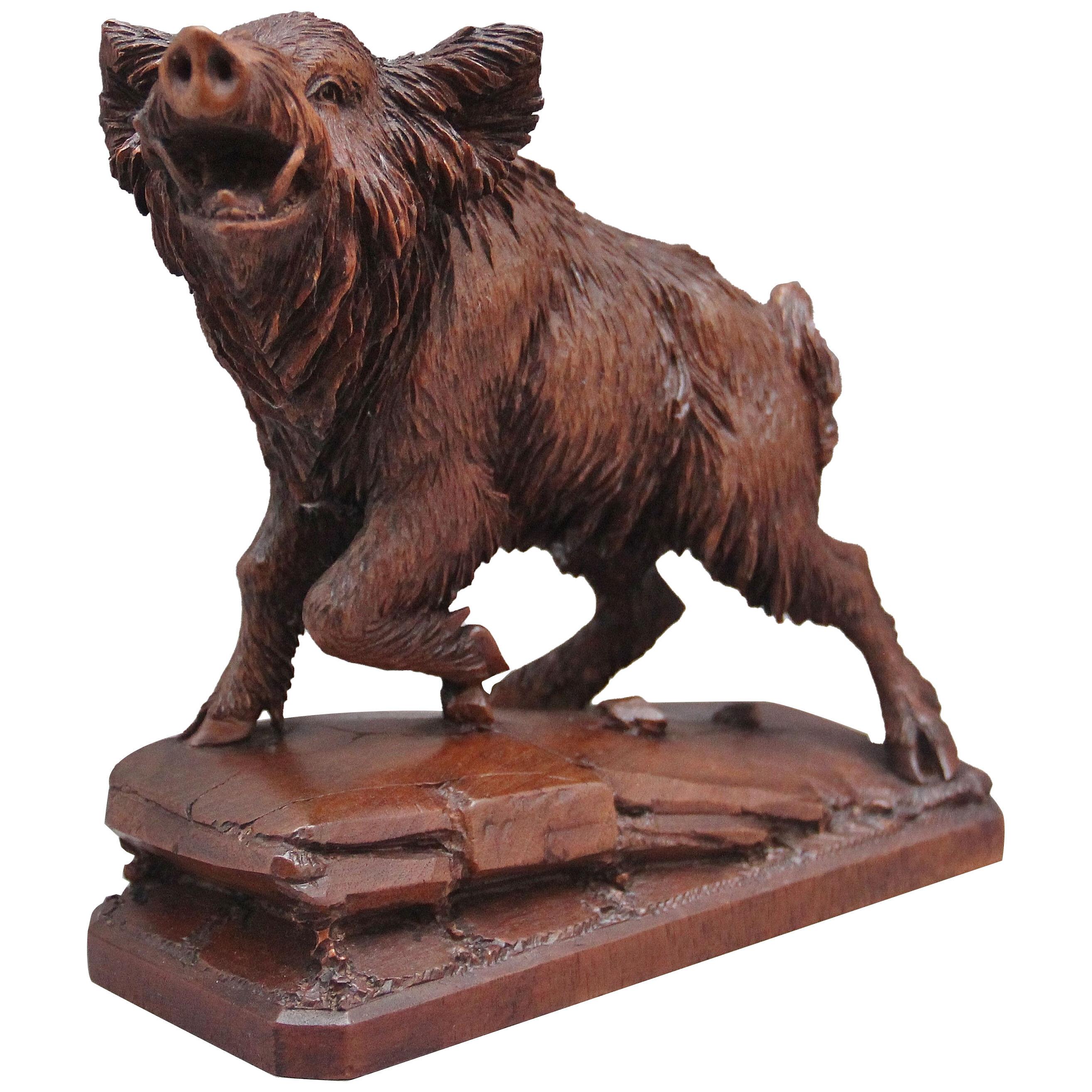 A lovely quality 19th Century black forest carving of a wild boar