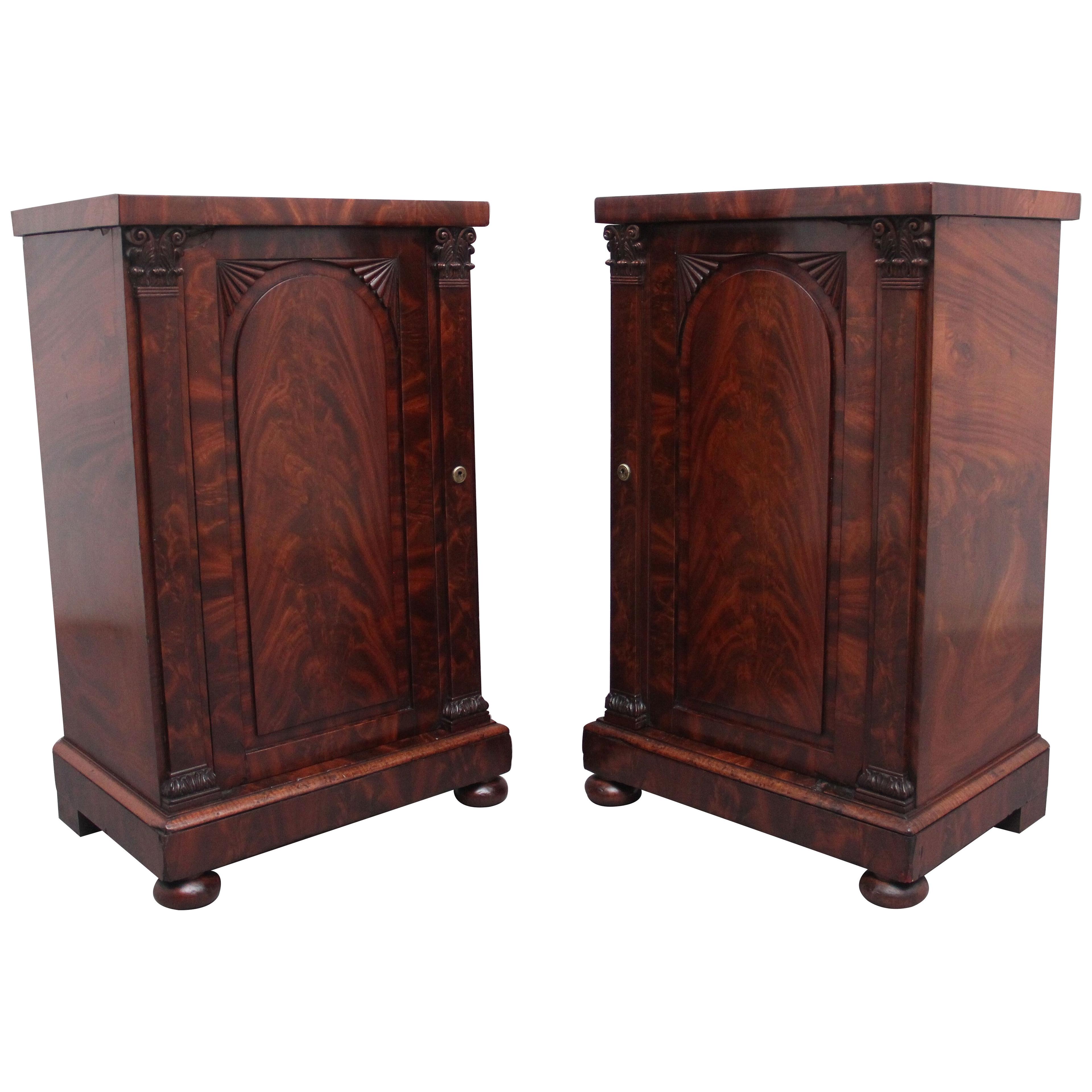 A pair of 19th Century flame mahogany bedside cabinets