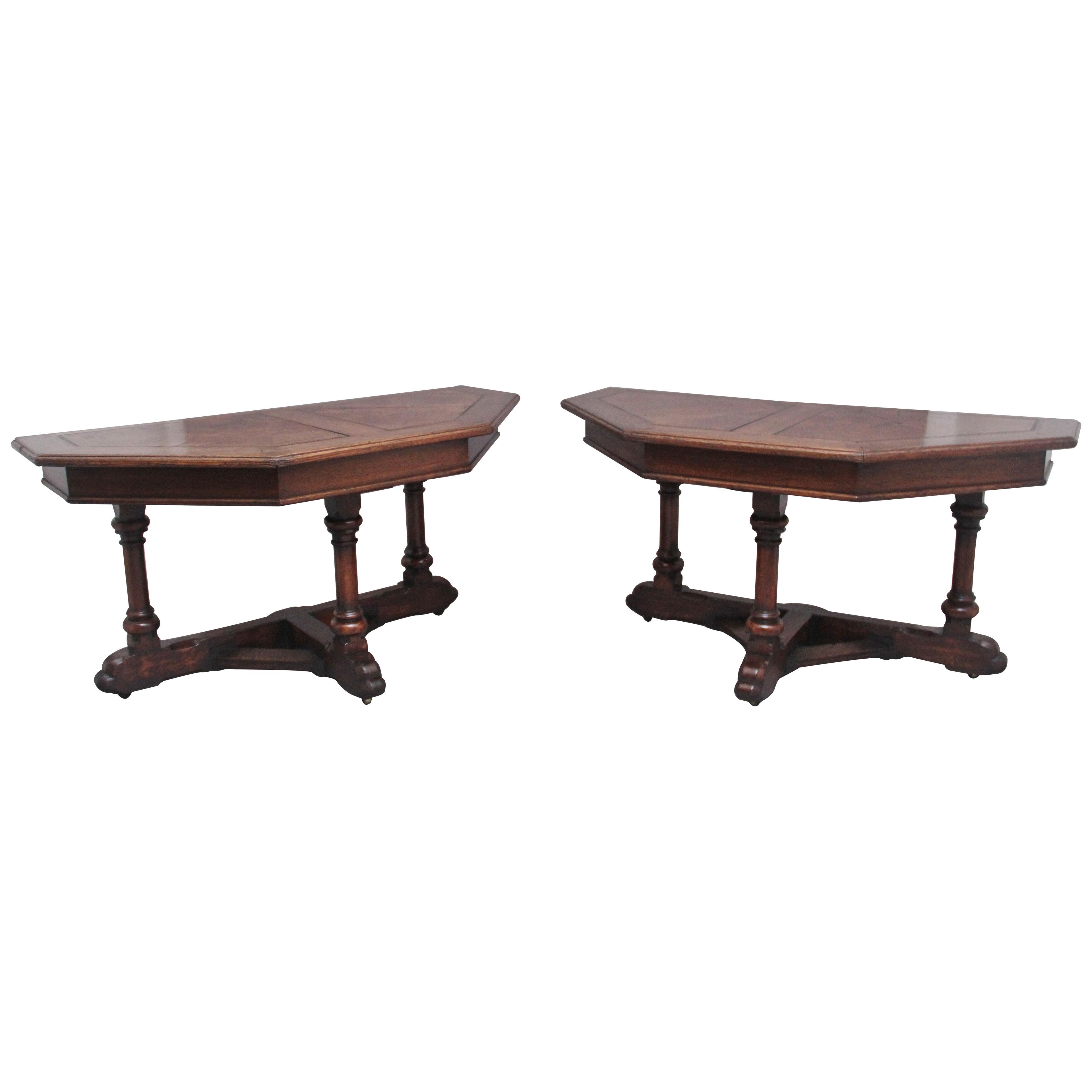 A pair of early 19th Century oak console tables